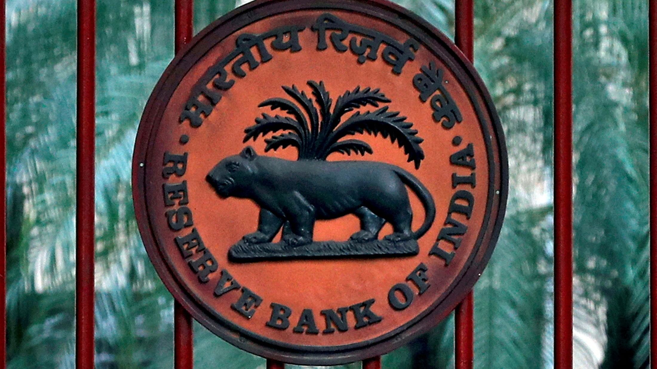 <div class="paragraphs"><p>A Reserve Bank of India (RBI) logo is seen at the gate of its office in New Delhi. </p></div>