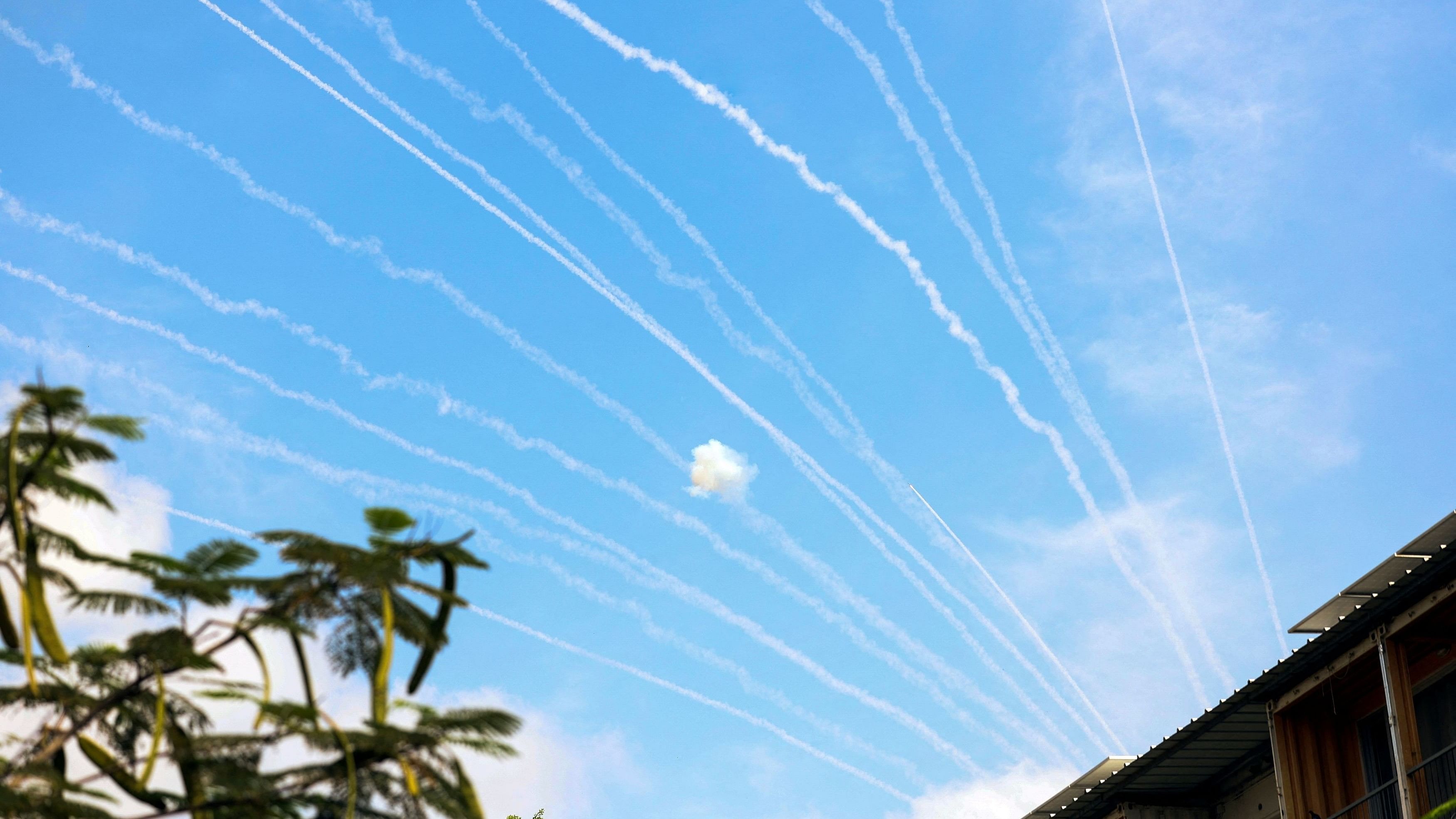 <div class="paragraphs"><p>The contrails of rockets launched from the Gaza Strip towards Israel are seen from Sderot, southern Israel.</p></div>