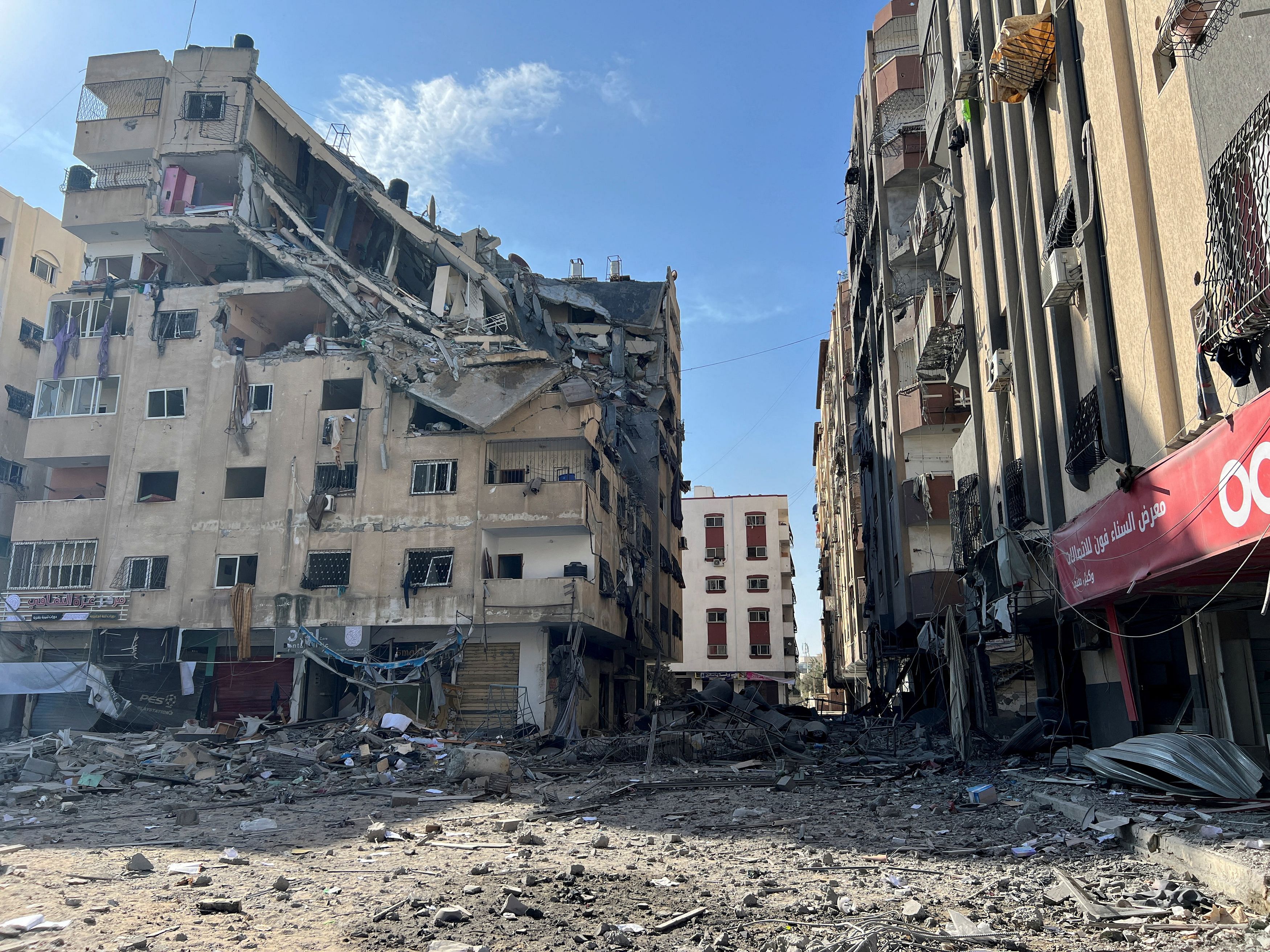 <div class="paragraphs"><p>Damaged residential buildings are seen in the aftermath of Israeli strikes, near Al-Quds hospital in Gaza City October 30, 2023. </p></div>