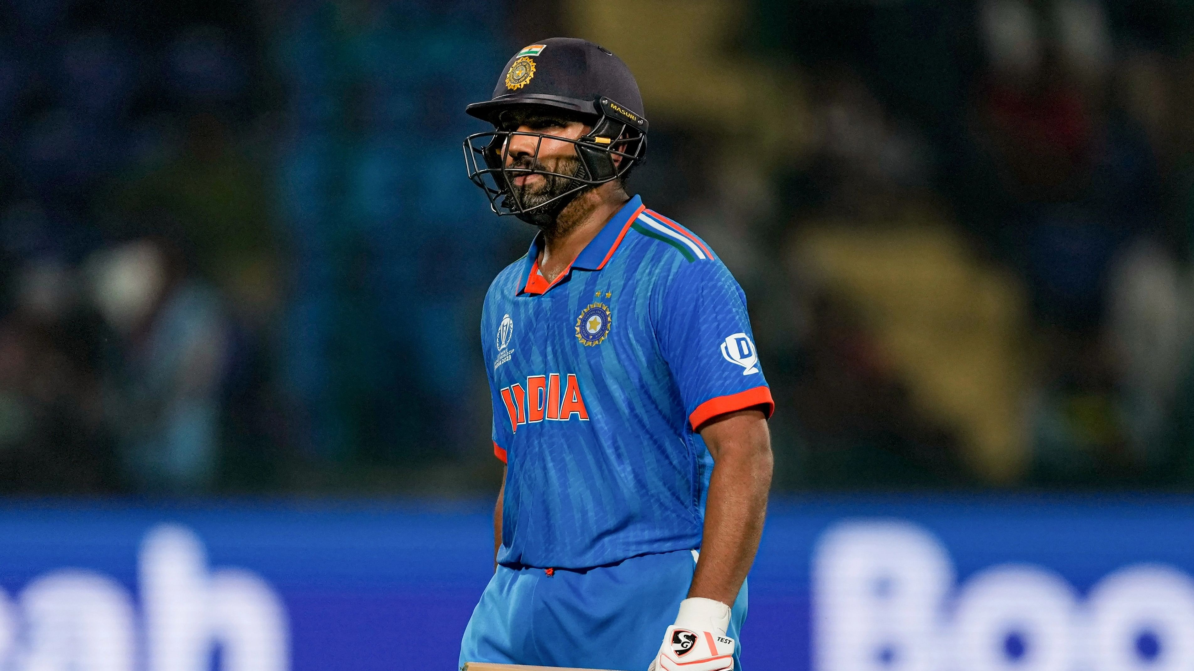 <div class="paragraphs"><p>Rohit Sharma walks off the field after losing his wicket during the  ICC Men's Cricket World Cup 2023 match between India and Afghanistan, at Arun Jaitley Stadium, in New Delhi.&nbsp;</p></div>