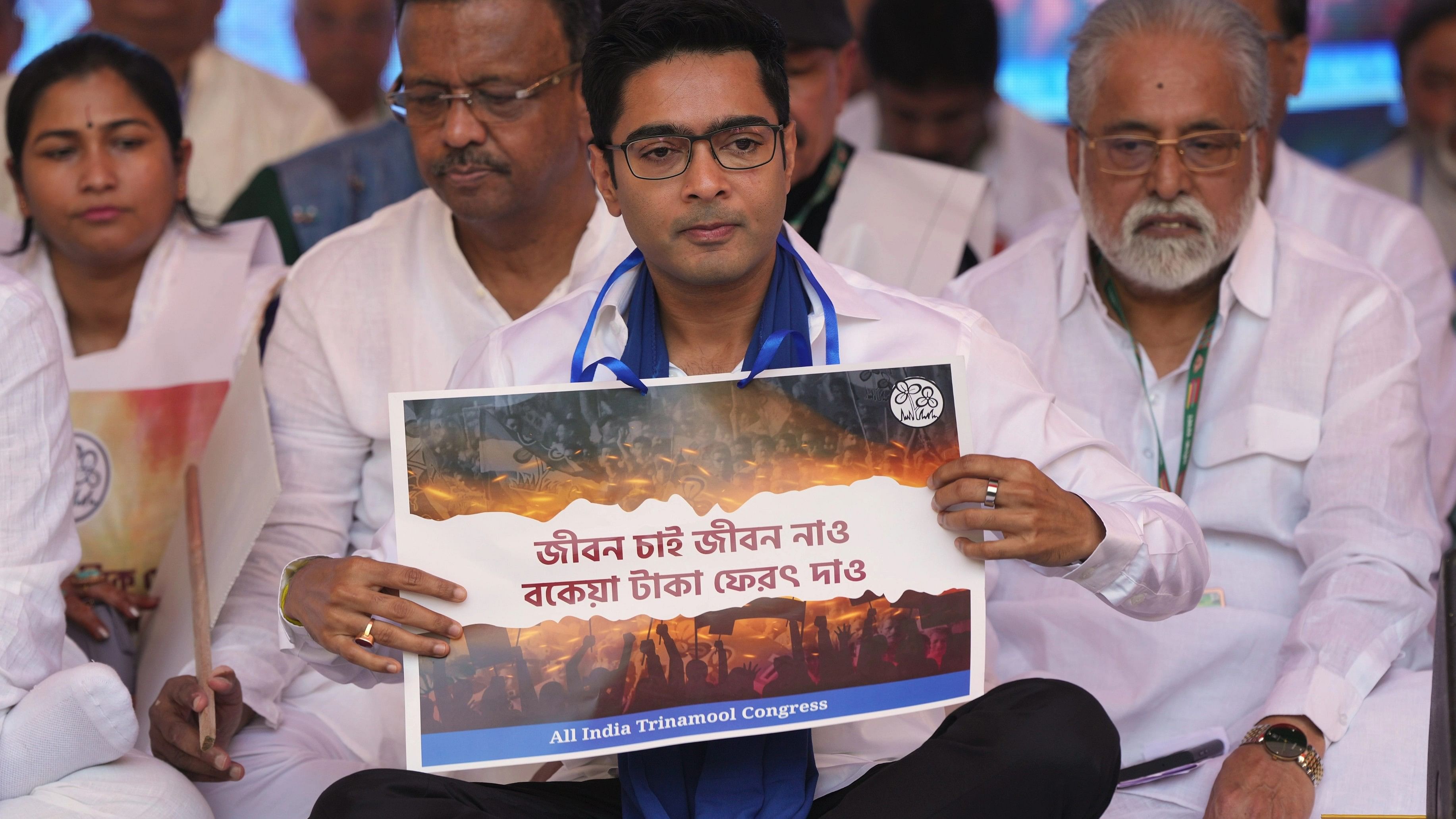 <div class="paragraphs"><p>TMC National General Secretary Abhishek Banerjee with party leaders during  during a protest against the central government over the alleged denial of MGNREGA scheme funds to the West Bengal government, at Jantar Mantar in New Delhi, Tuesday, Oct. 3, 2023.</p></div>