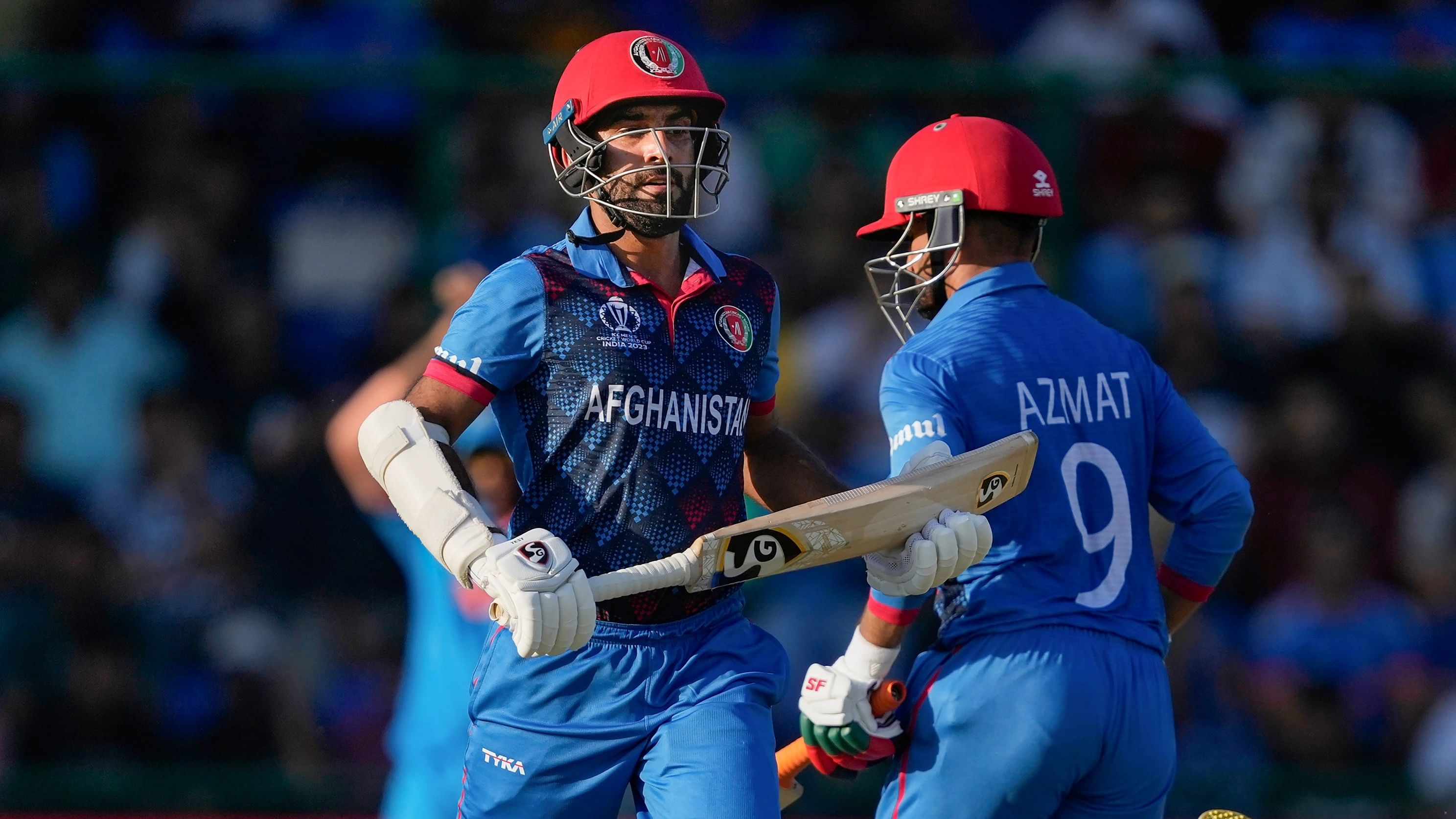 <div class="paragraphs"><p>Afghanistan's Hashmatullah Shahidi and Azmatullah Omarzai run between the wickets during the ICC Men's Cricket World Cup 2023 match.</p></div>