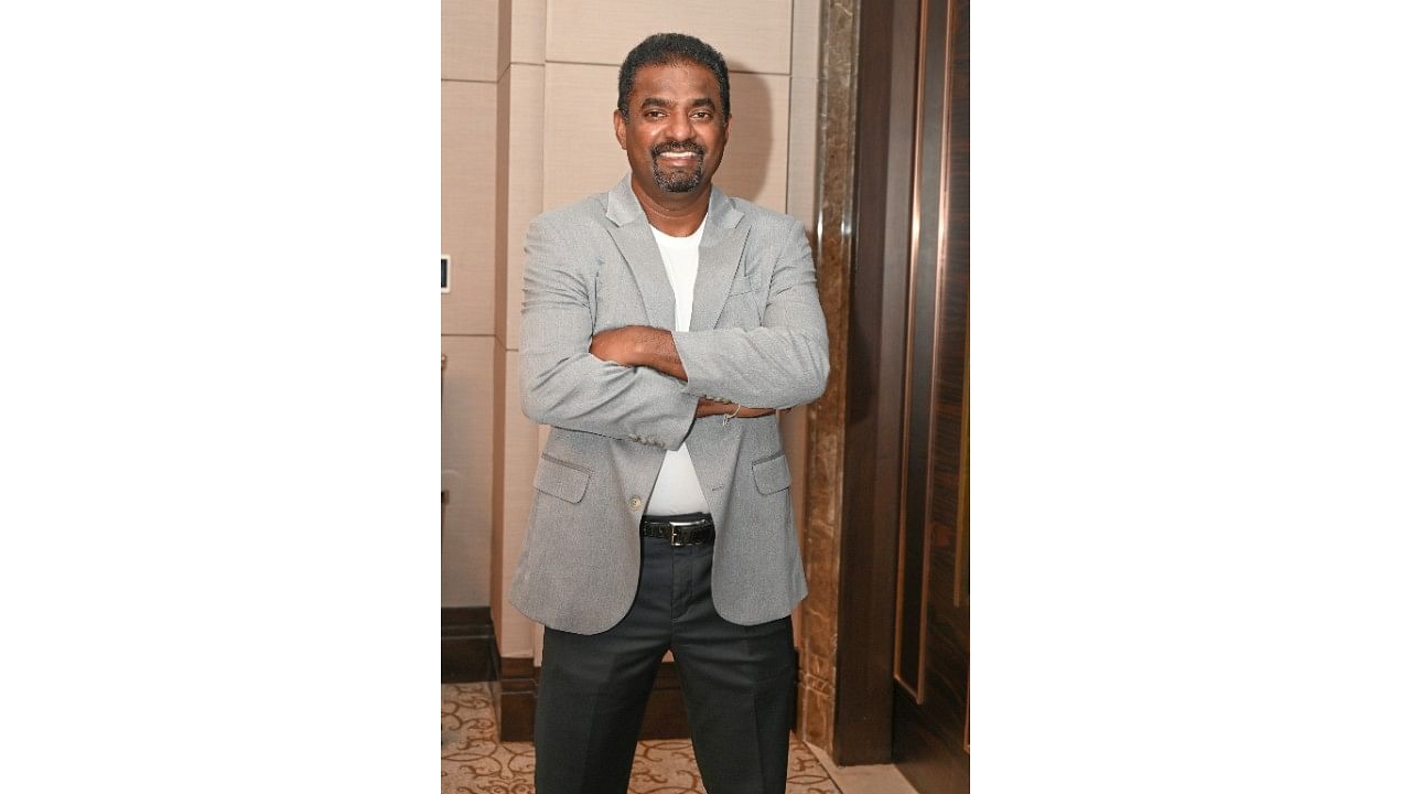 <div class="paragraphs"><p>Muttiah Muralitharan poses during a press meet at the Shangri La hotel in Bengaluru on Sunday. </p></div>