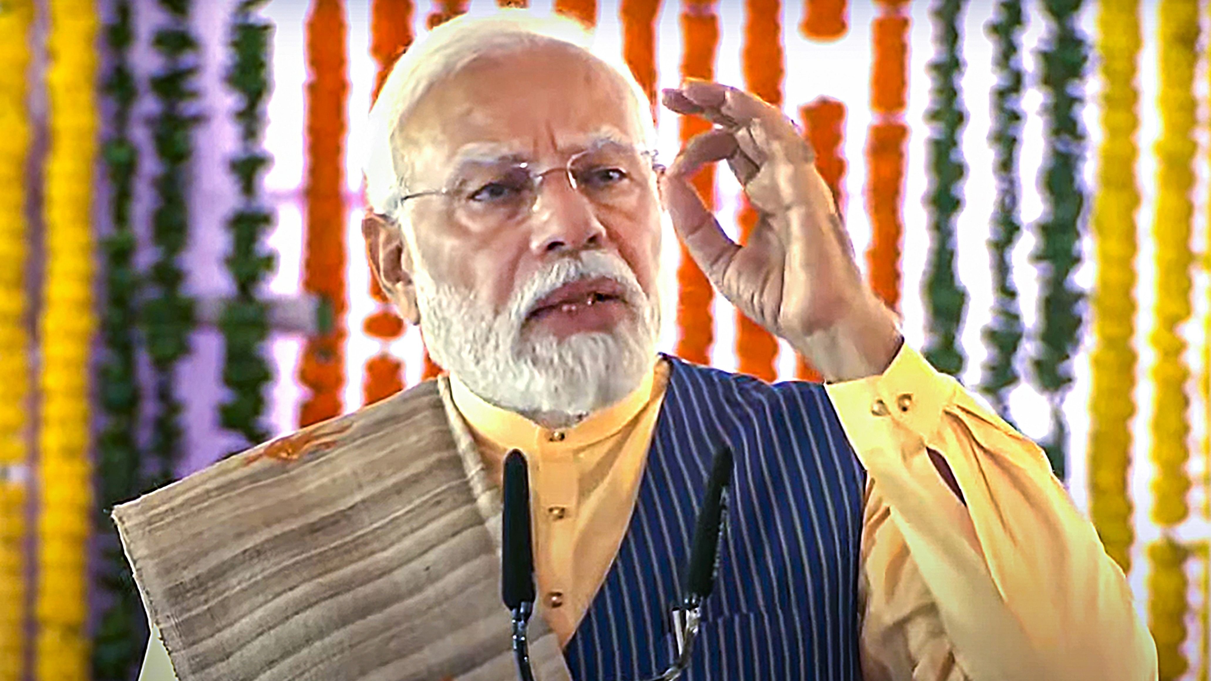 <div class="paragraphs"><p>Prime Minister Narendra Modi addresses during an event organised for laying of foundation stone of various developmental projects, at Jagdalpur in Bastar district.</p></div>