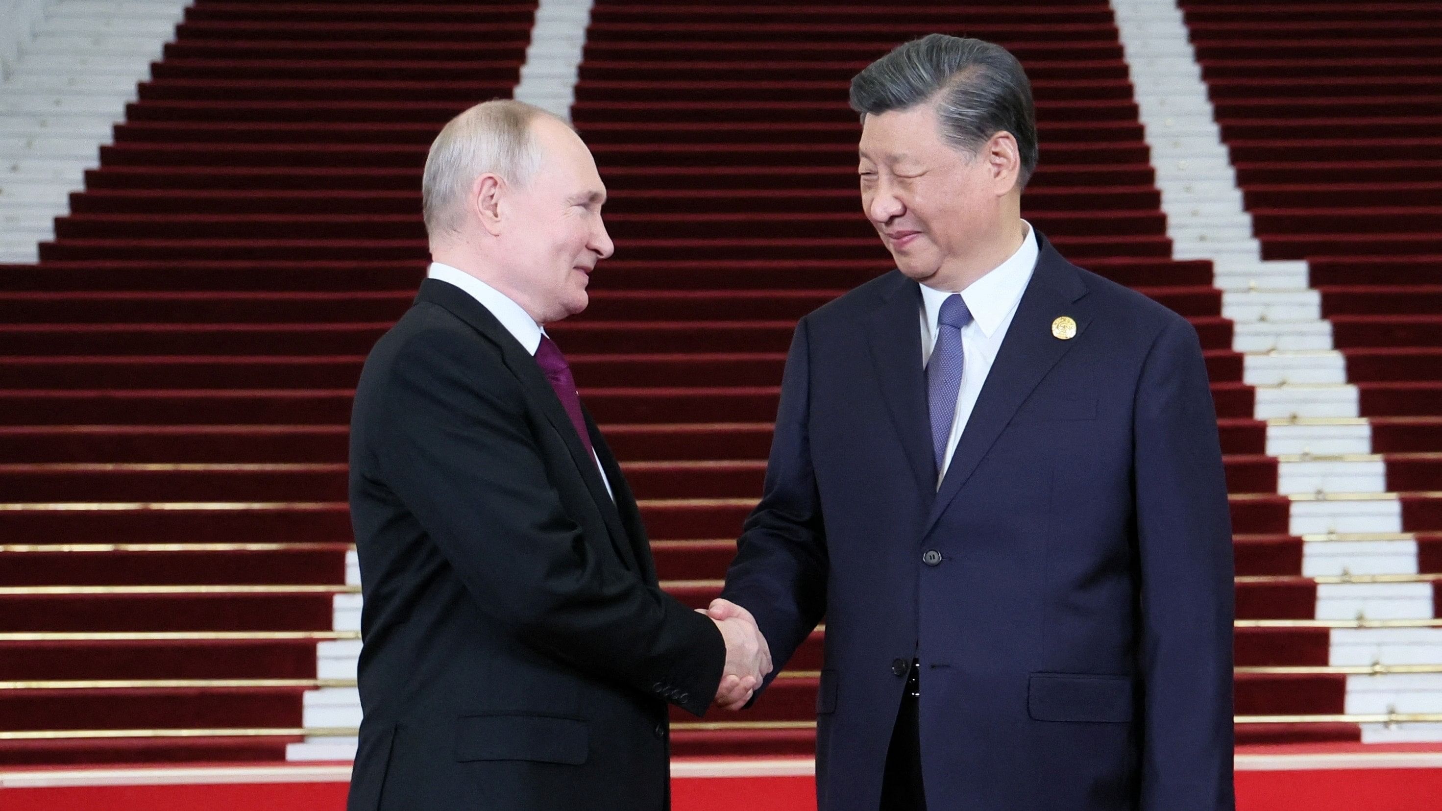 <div class="paragraphs"><p>Russian President Vladimir Putin is welcomed by Chinese&nbsp;President&nbsp;Xi Jinping during a ceremony at the Belt and Road Forum in Beijing, China, October 17, 2023. </p></div>