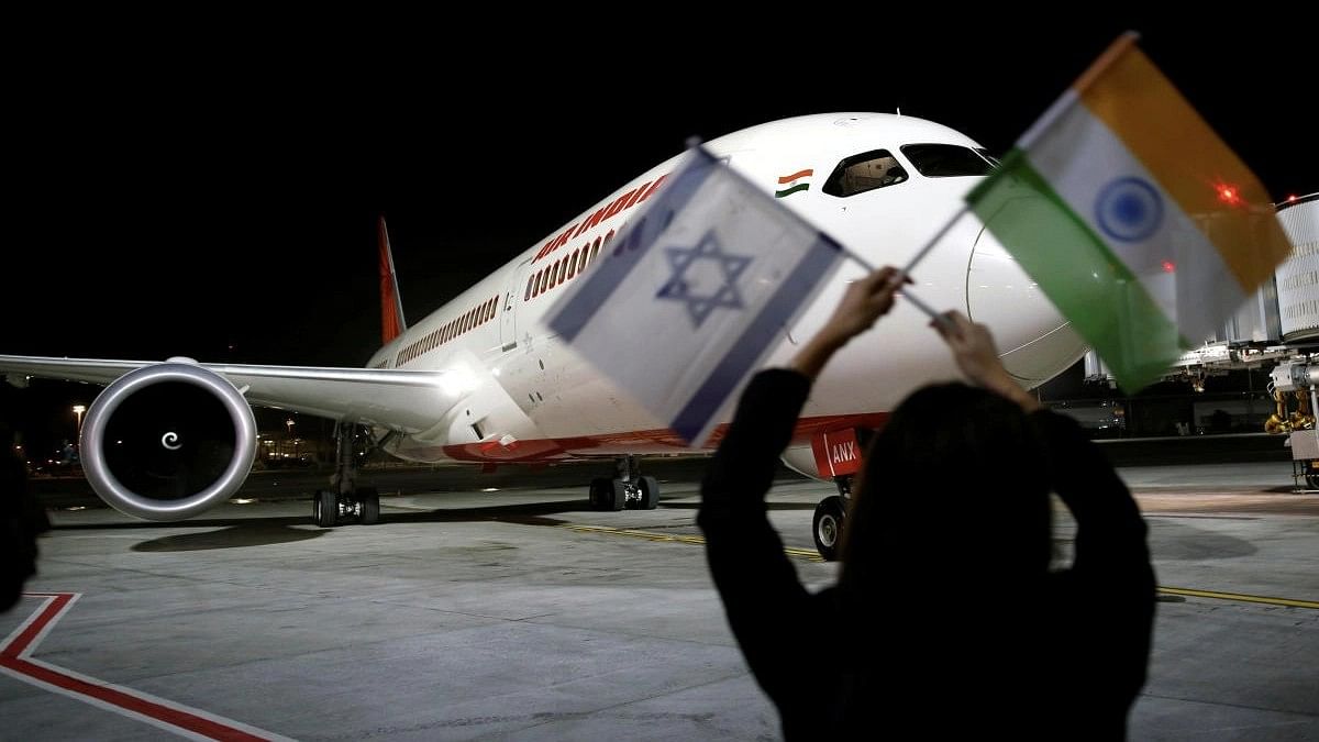 <div class="paragraphs"><p>An Air India Boeing 787-8 Dreamliner plane lands at the Ben Gurion International airport.</p></div>