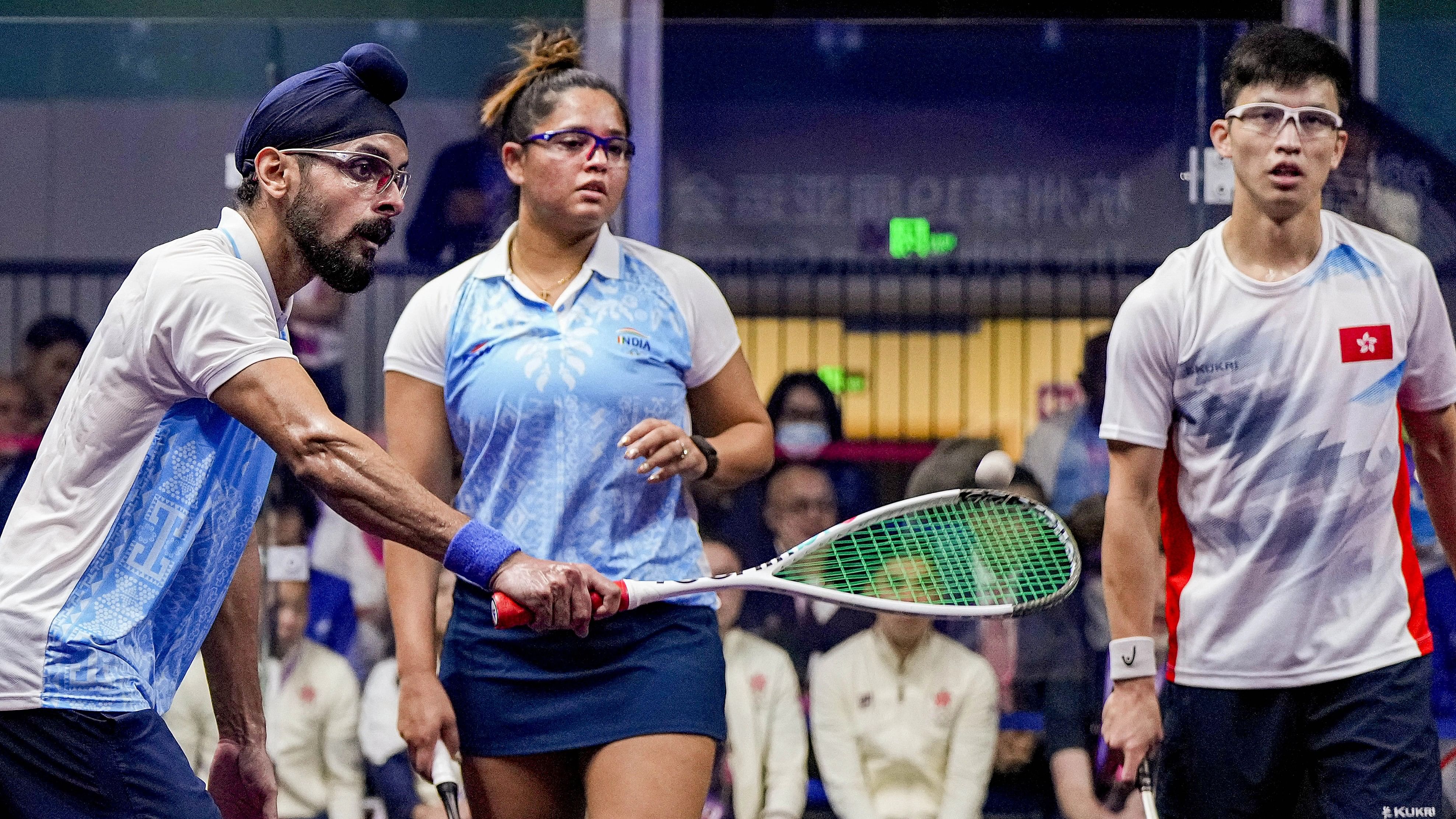 <div class="paragraphs"><p>Dipika Pallikal and Harinder Pal Singh Sandhu during the semifinal match of Mixed Doubles squash event against Hong Kong's Ka Yi Lee and Chi Him Wong at the 19th Asian Games, in Hangzhou, China.</p></div>