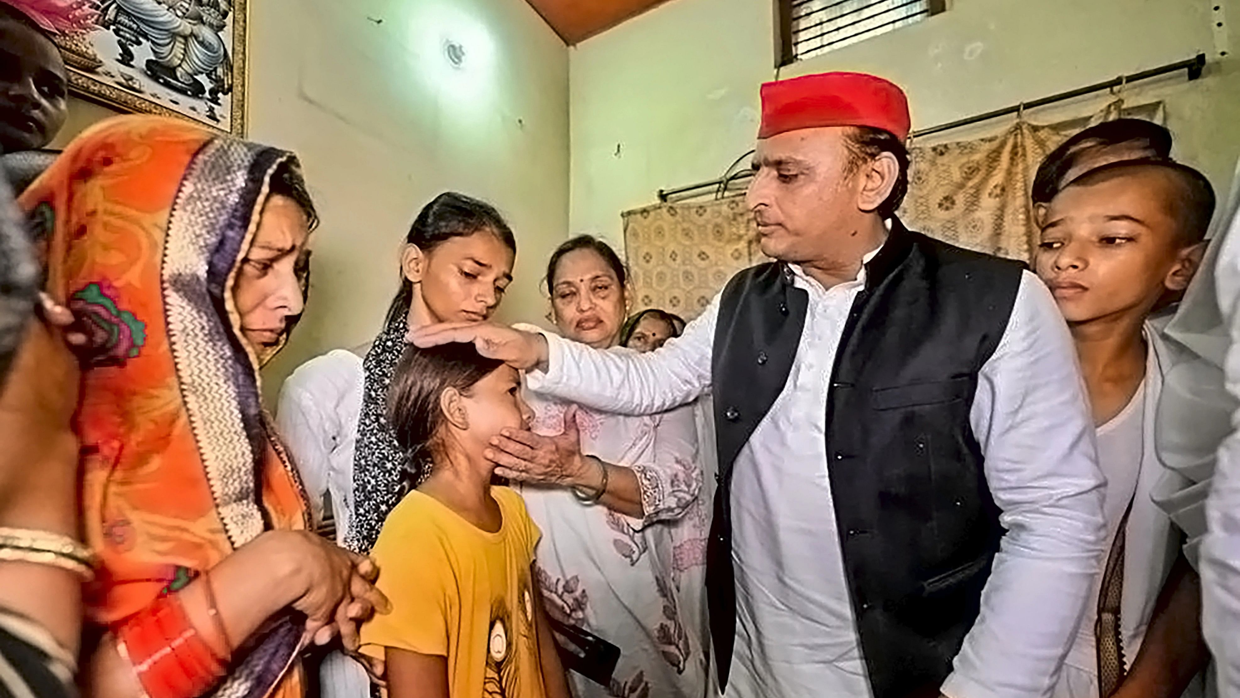 <div class="paragraphs"><p>Deoria: Samajwadi Party President Akhilesh Yadav meets family members of people killed in a property dispute, at Fatehpur village in Deoria district.&nbsp;</p></div>