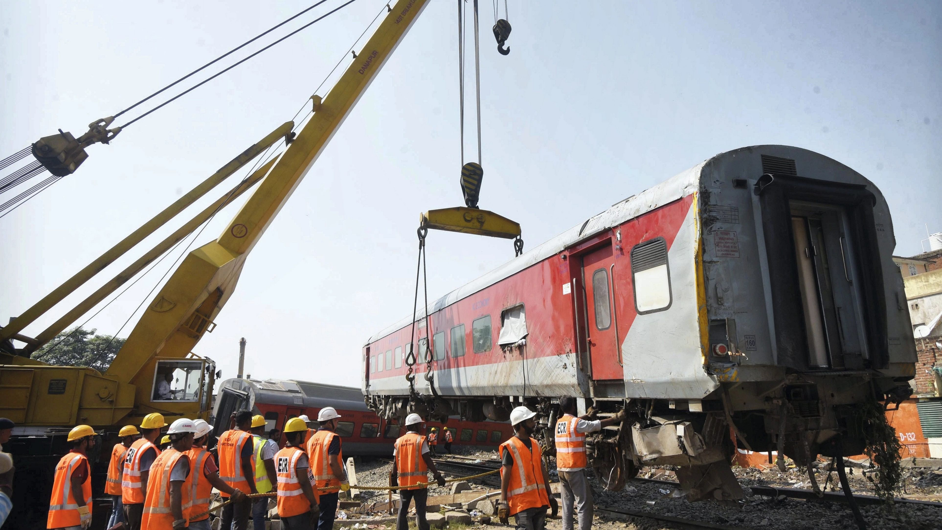 <div class="paragraphs"><p>A crane removes a derailed coach of  North East Express from the track a day after its derailment near Raghunathpur railway station in Buxar district, Thursday, October 12, 2023. </p></div>