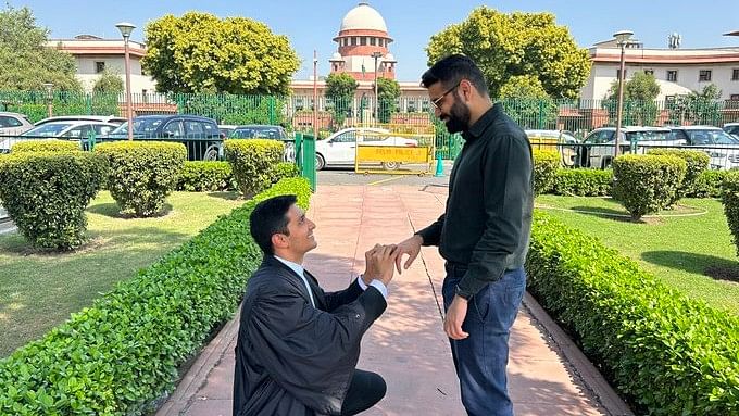 <div class="paragraphs"><p>Utkarsh Saxena, a gay lawyer, exchanging rings with his partner Ananya Kotia, a PhD student at the London School of Economics, (LSE) outside the Supreme Court.</p></div>