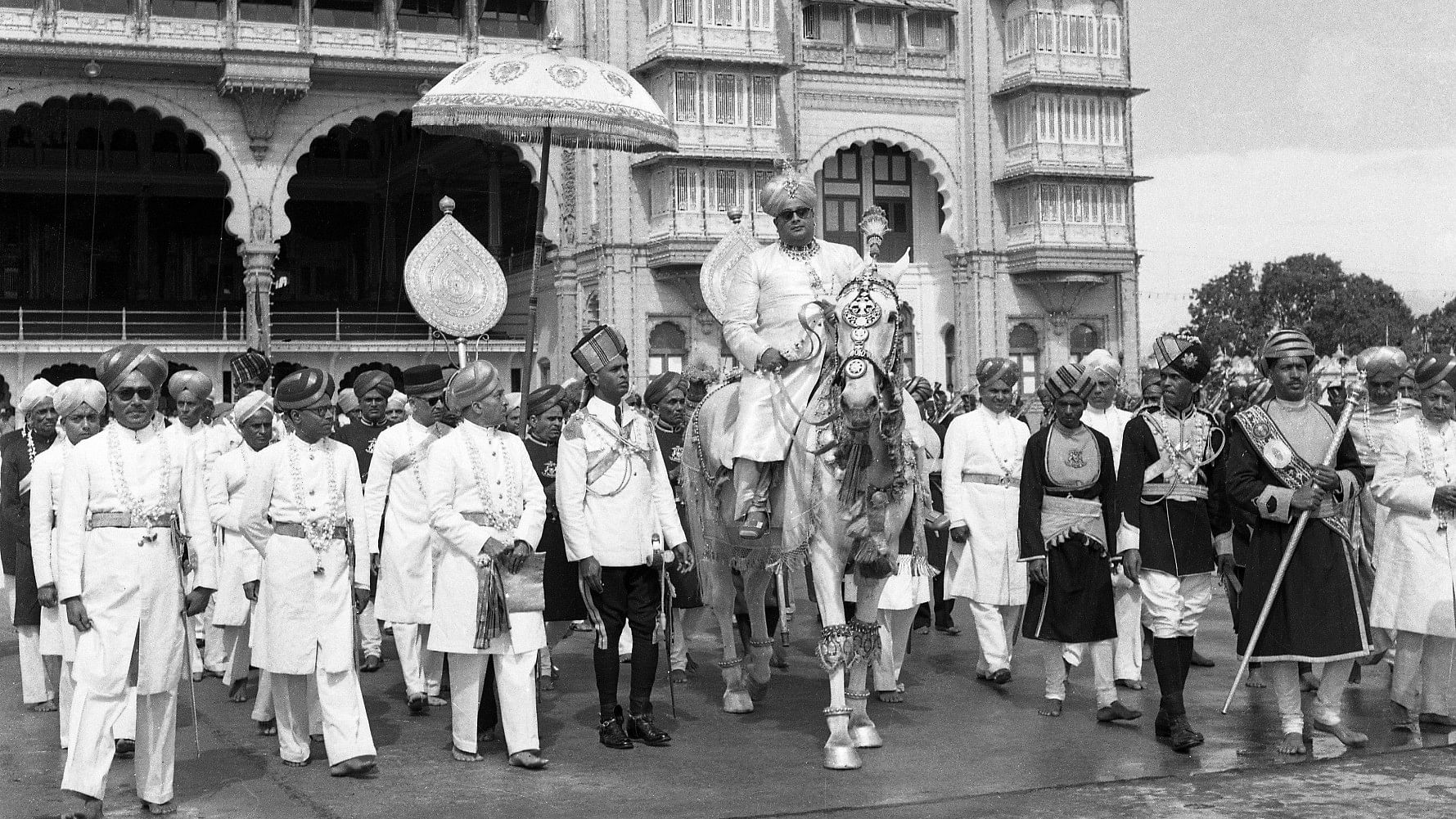 Jayachamaraja Wadiyar on a decorated horse during the Dasara procession.
