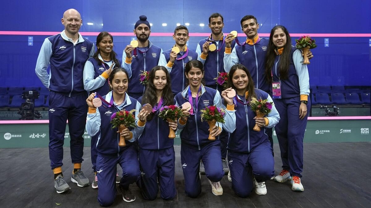 <div class="paragraphs"><p>The Indian squash team, which a won a total of five medal at the recently-concluded Asian Games in Hangzhou, pose with their medals. </p></div>
