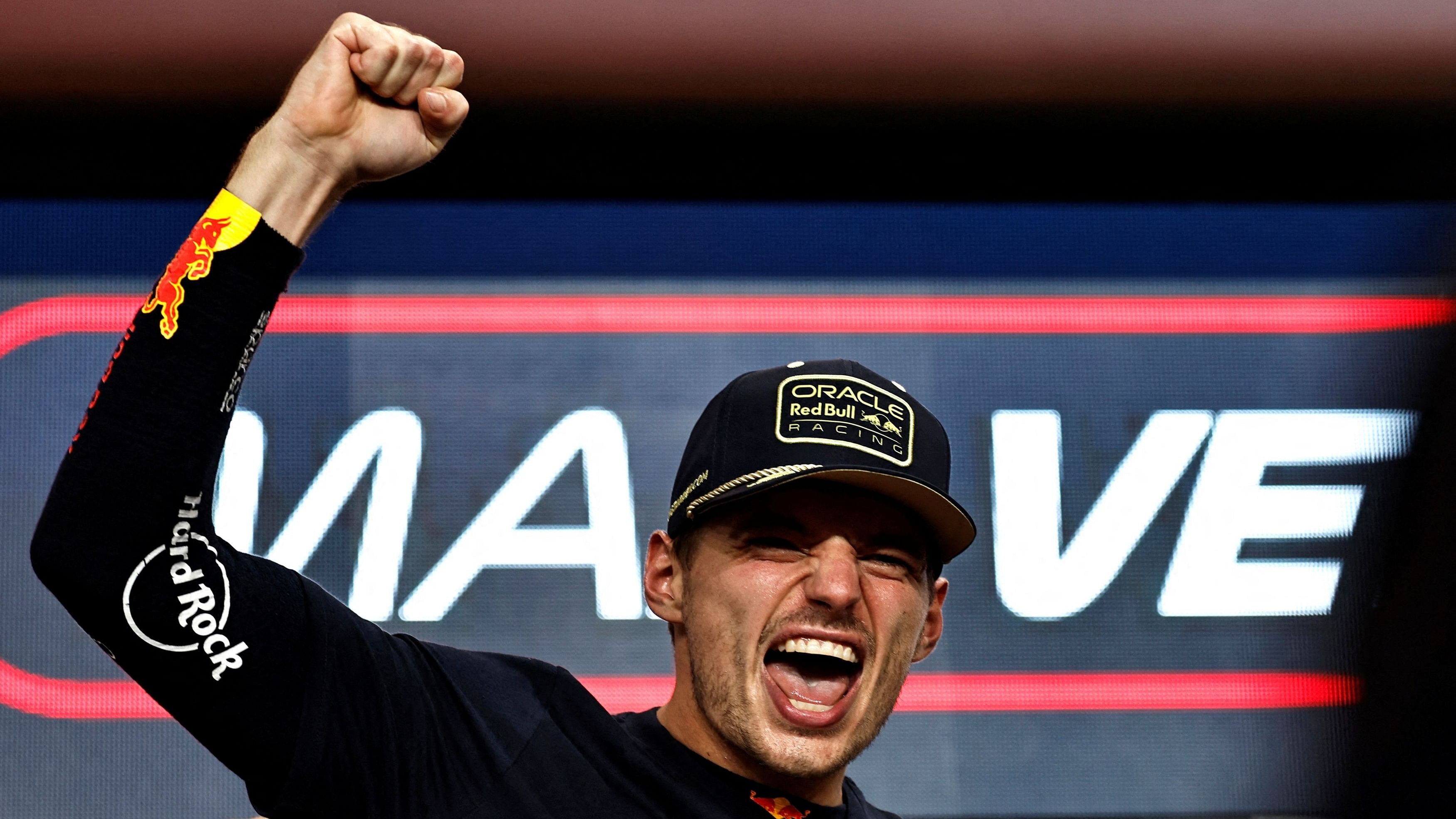 <div class="paragraphs"><p>Red Bull's Max Verstappen celebrates after winning the championship.</p></div>