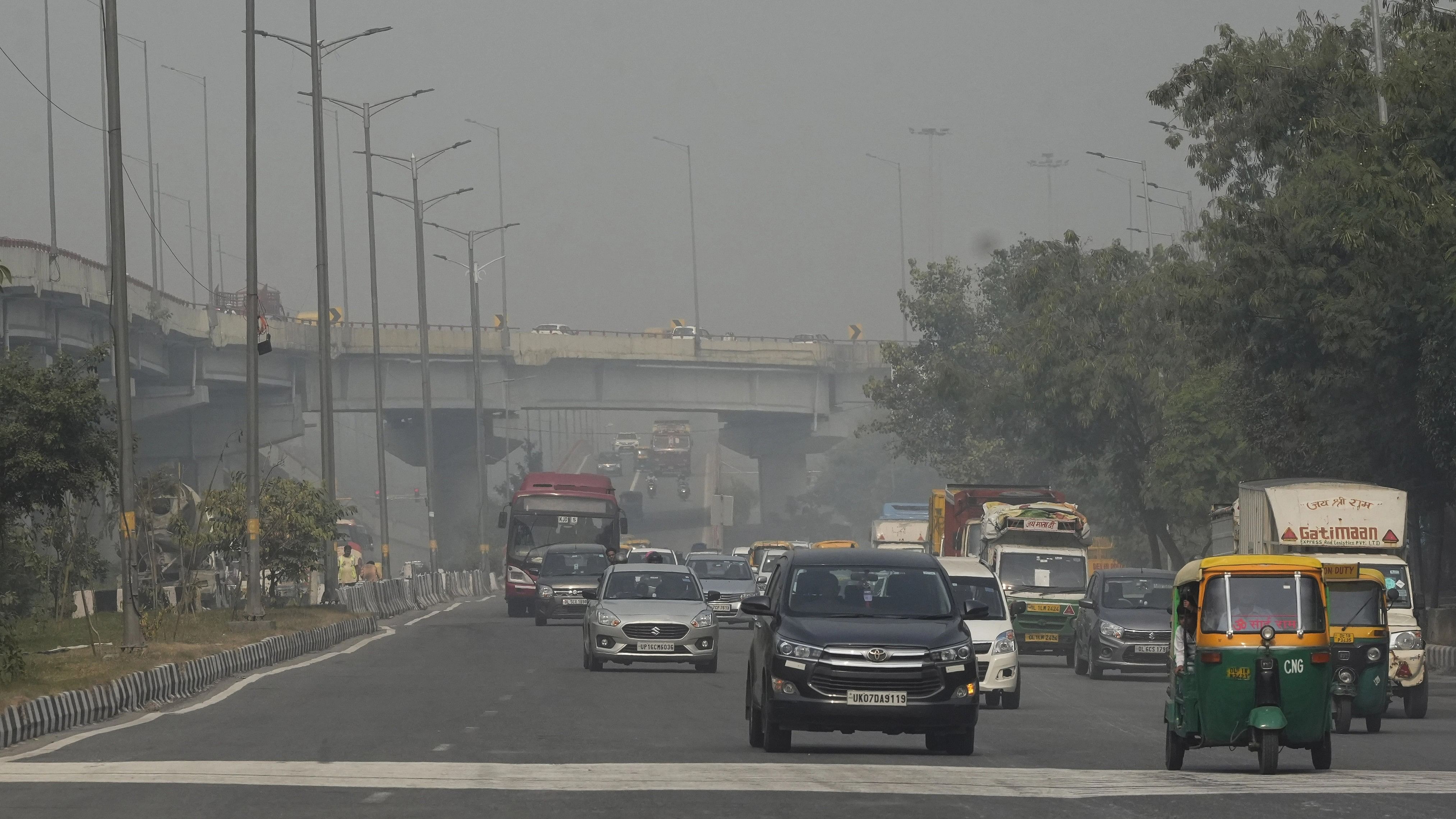 <div class="paragraphs"><p>Commuters on a road amid smog, in New Delhi.</p></div>