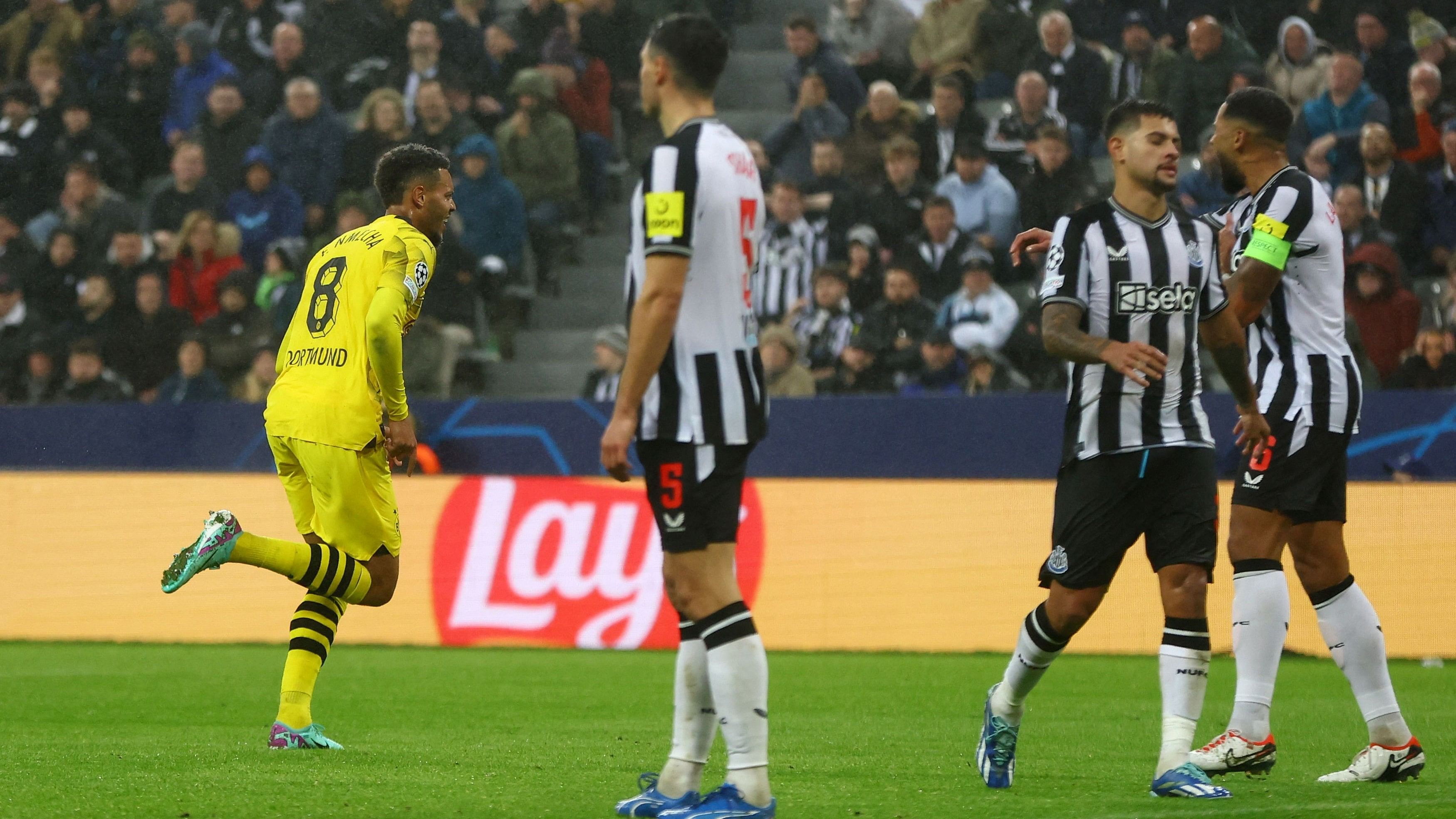 <div class="paragraphs"><p>Borussia Dortmund's Felix Nmecha celebrates scoring their first goal.</p></div>