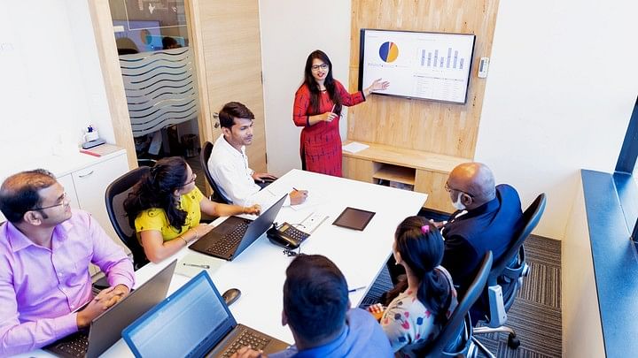 <div class="paragraphs"><p>Representative image showing a boardroom meeting lead by a woman.</p></div>