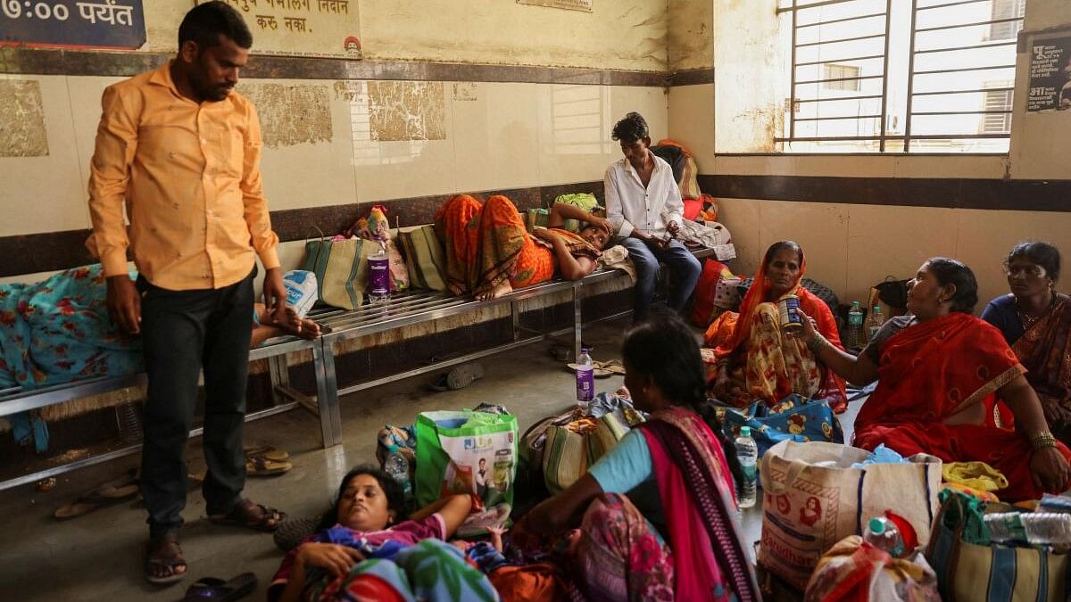 <div class="paragraphs"><p>Relatives of patients admitted at the Shankarrao Chavan Government Medical College and Hospital are seen inside the hospital, in Nanded, October 3, 2023.</p></div>
