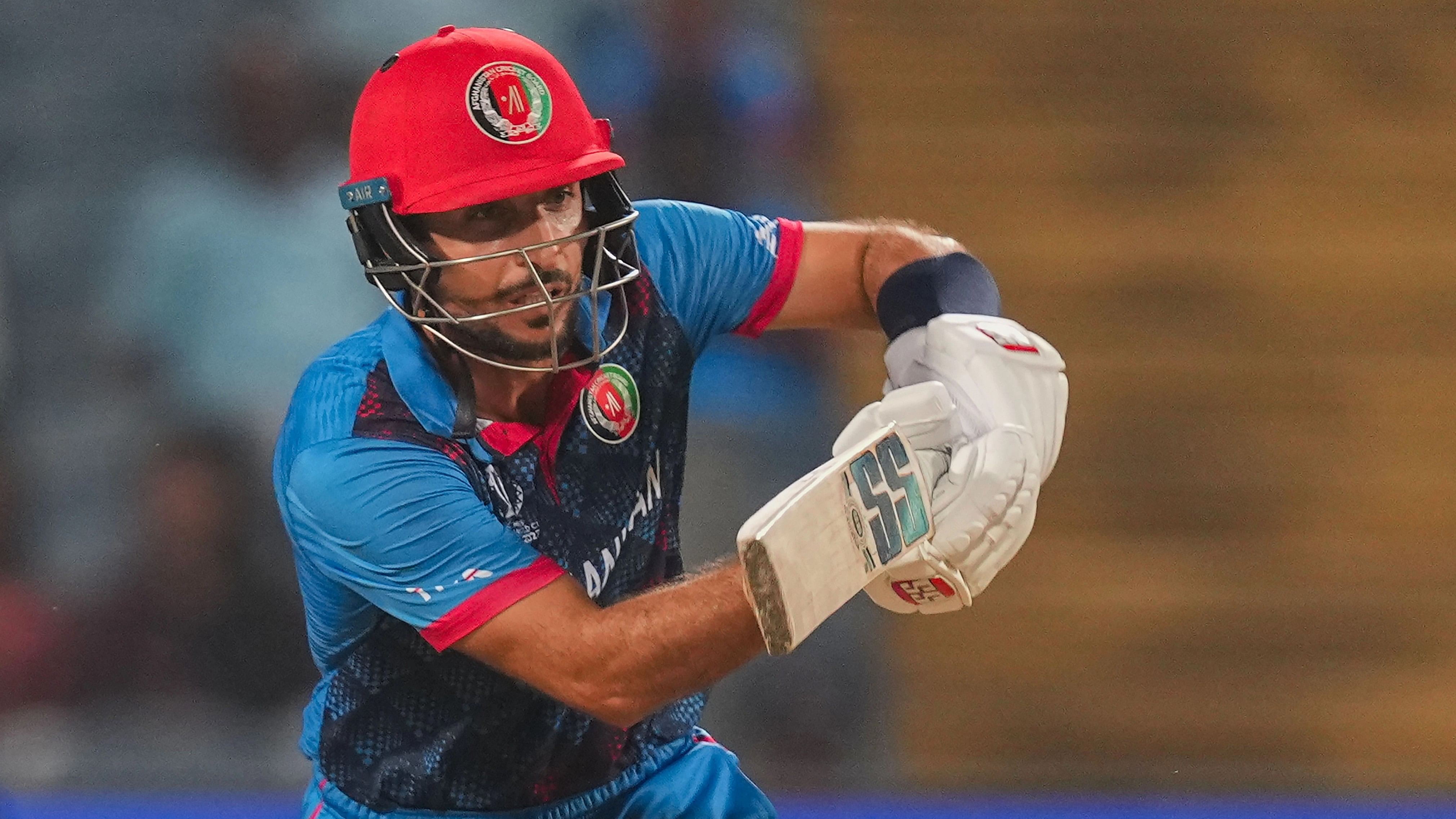 <div class="paragraphs"><p>Afghanistan's batter Rahmat Shah plays a shot en route to his <strong>fifty&nbsp;</strong>during the ICC Men's Cricket World Cup 2023 match between Sri Lanka and Afghanistan, at Maharashtra Cricket Association Stadium in Pune.</p></div>