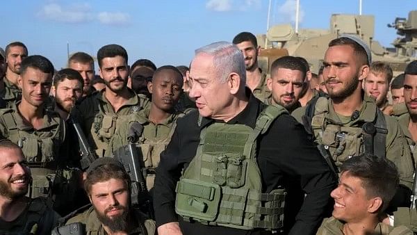 <div class="paragraphs"><p>Israeli PM Benjamin Netanyahu meets IDF soldiers stationed along the country's southern border with Gaza.</p></div>