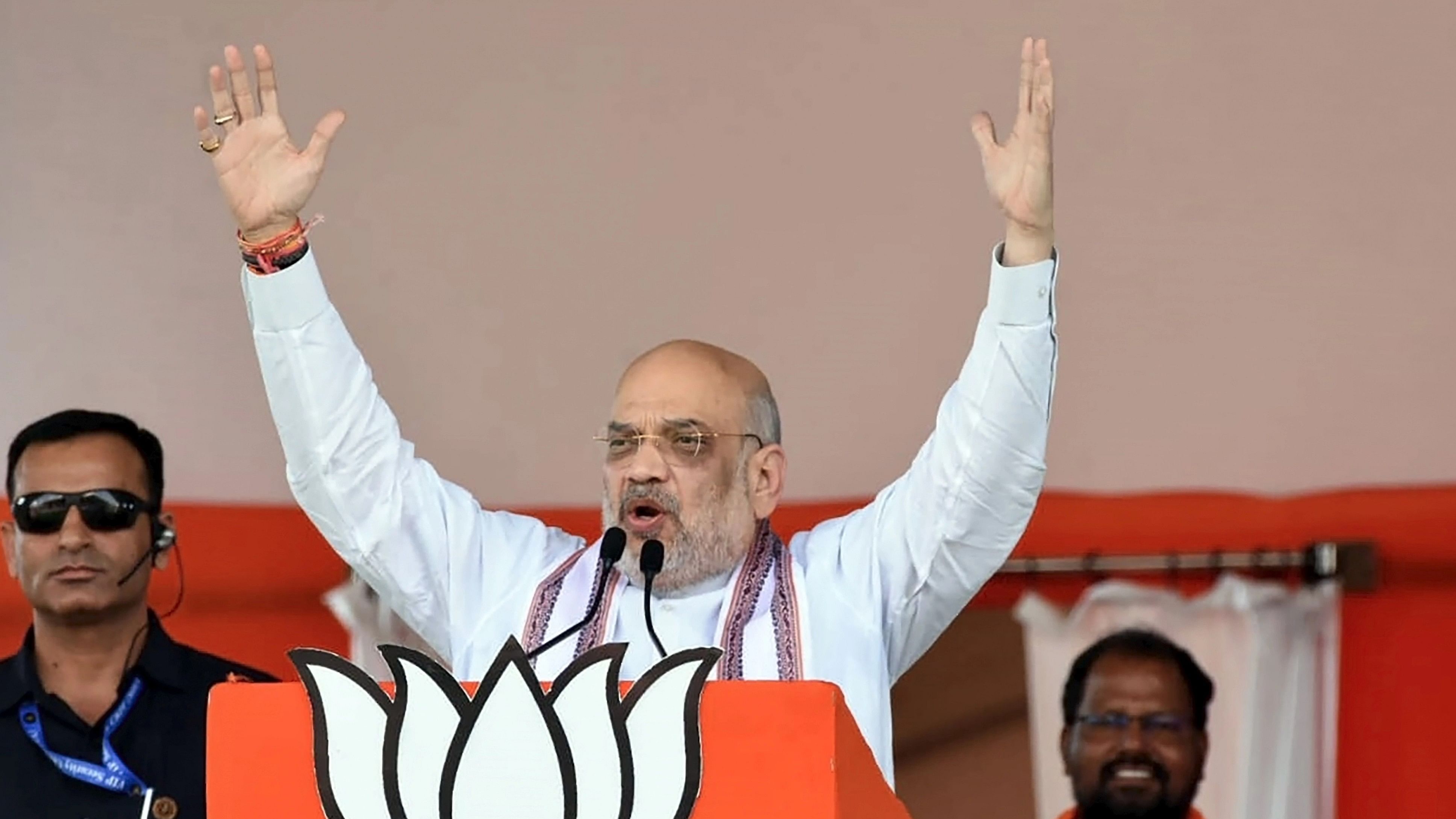 <div class="paragraphs"><p>Union Home Minister Amit Shah speaks during a public meeting ahead of Telangana Assembly elections, in Adilabad.</p></div>