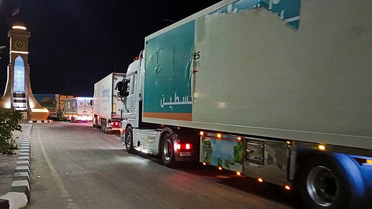 <div class="paragraphs"><p>A convoy of trucks carrying humanitarian aid from Egyptian NGOs for Palestinians start to move from Al-Arish to Rafah city as they wait for an agreement on the opening on the Rafah border crossing to enter Gaza, amid the ongoing conflict between Israel and Hamas, in the city of Al-Arish, Sinai peninsula, Egypt.</p></div>