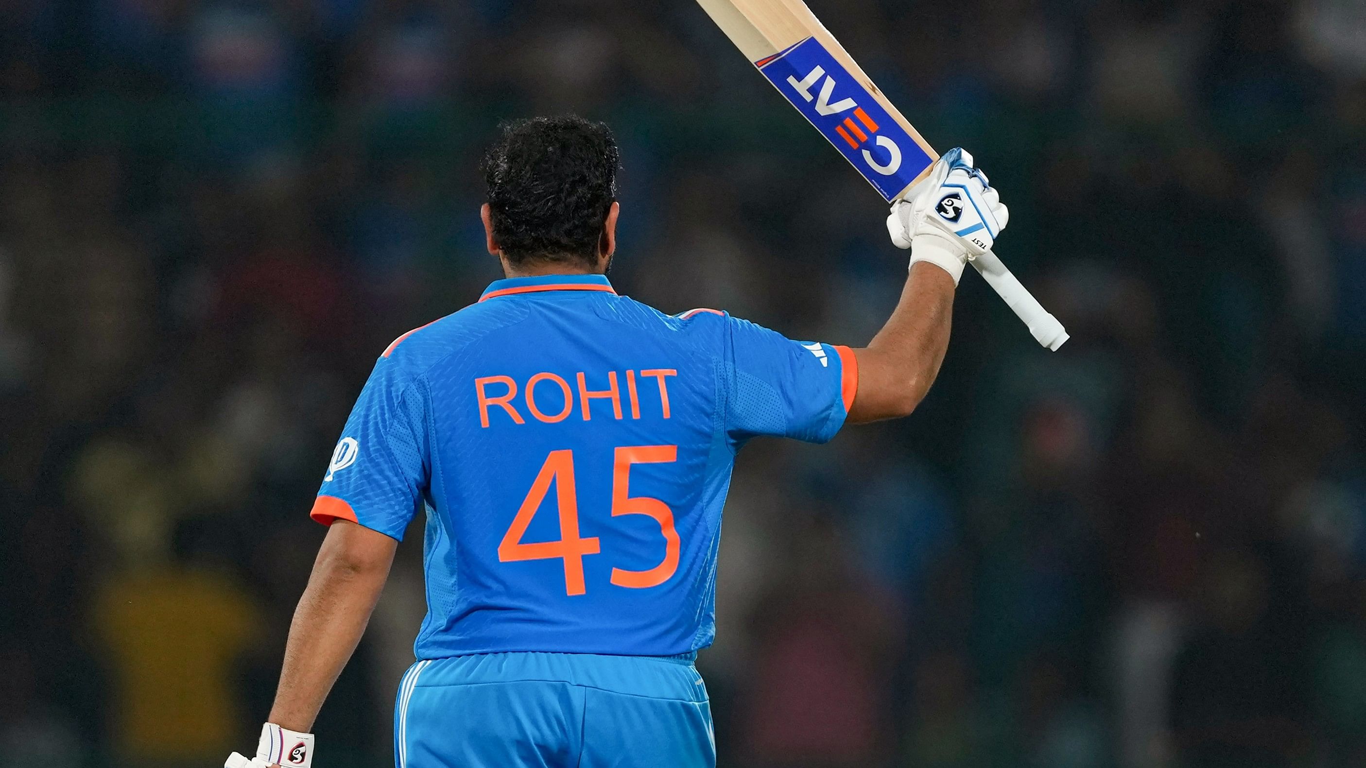 <div class="paragraphs"><p>Rohit Sharma celebrates his century.</p></div>