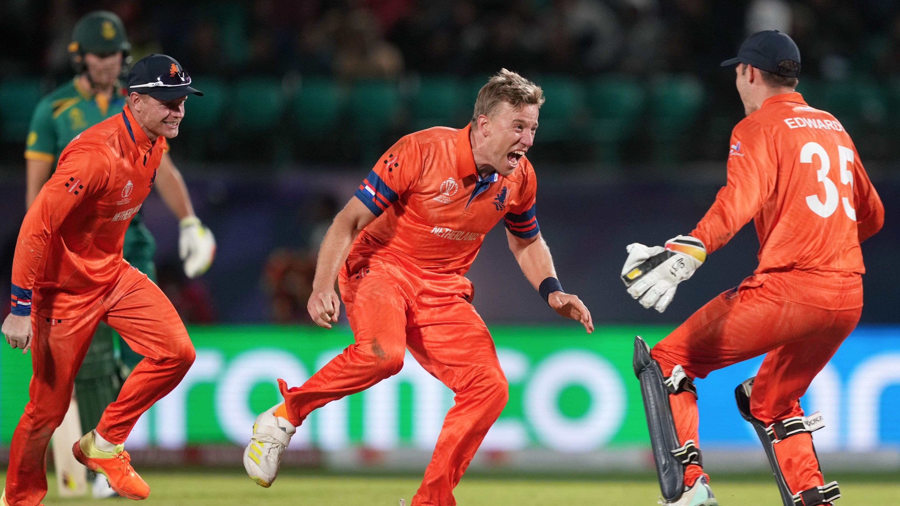 <div class="paragraphs"><p>Netherlands' Logan van Beek celebrates with teammates after taking the wicket of South Africa's David Miller.</p></div>