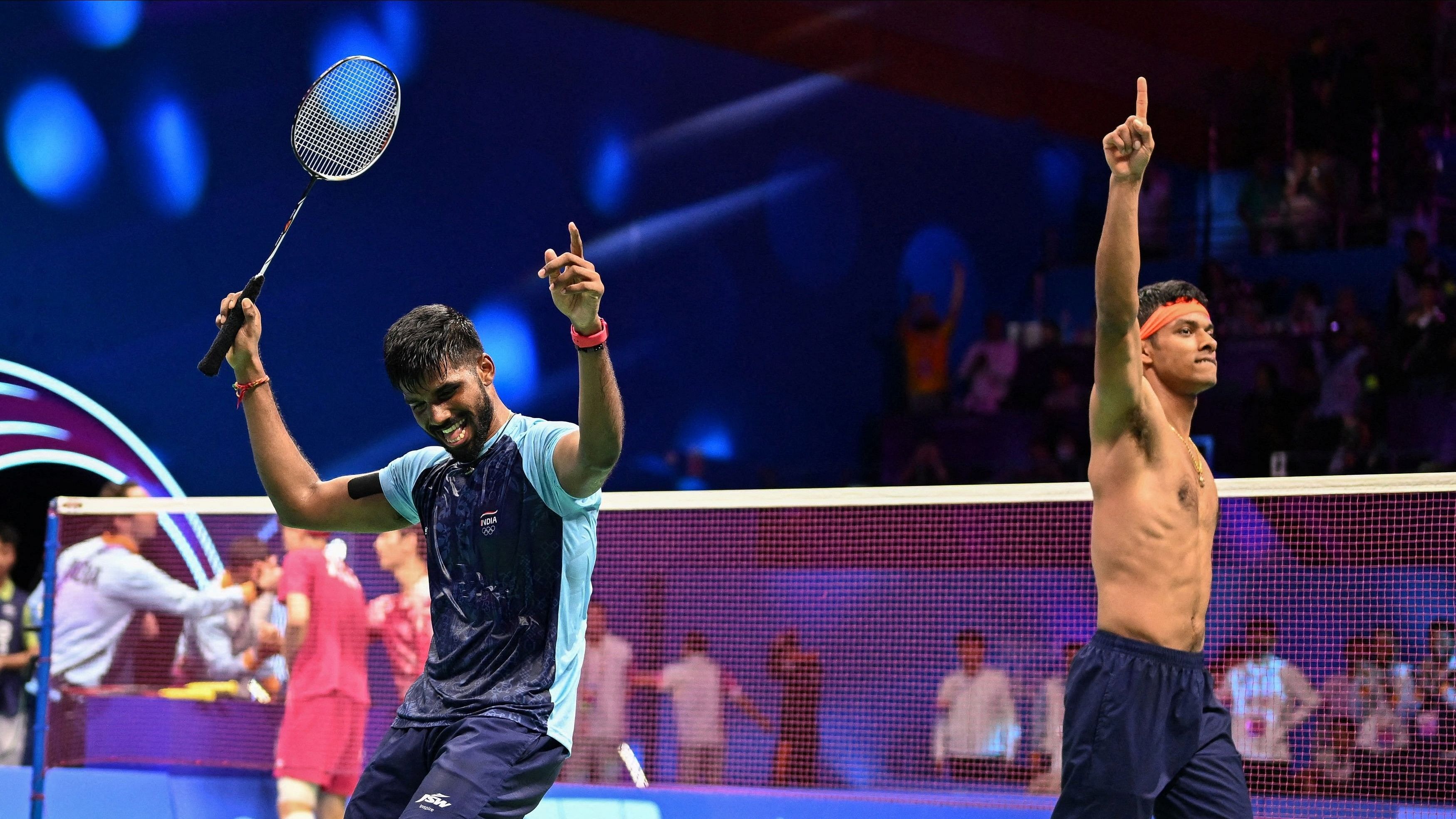 <div class="paragraphs"><p>India's Satwik Sairaj Rankireddy and Chirag Chandrashekhar Shetty celebrate during the Men's Doubles final against South Korea's Choi Solgyu and Kim Wonho at the Asian Games, October 7, 2023.</p></div>