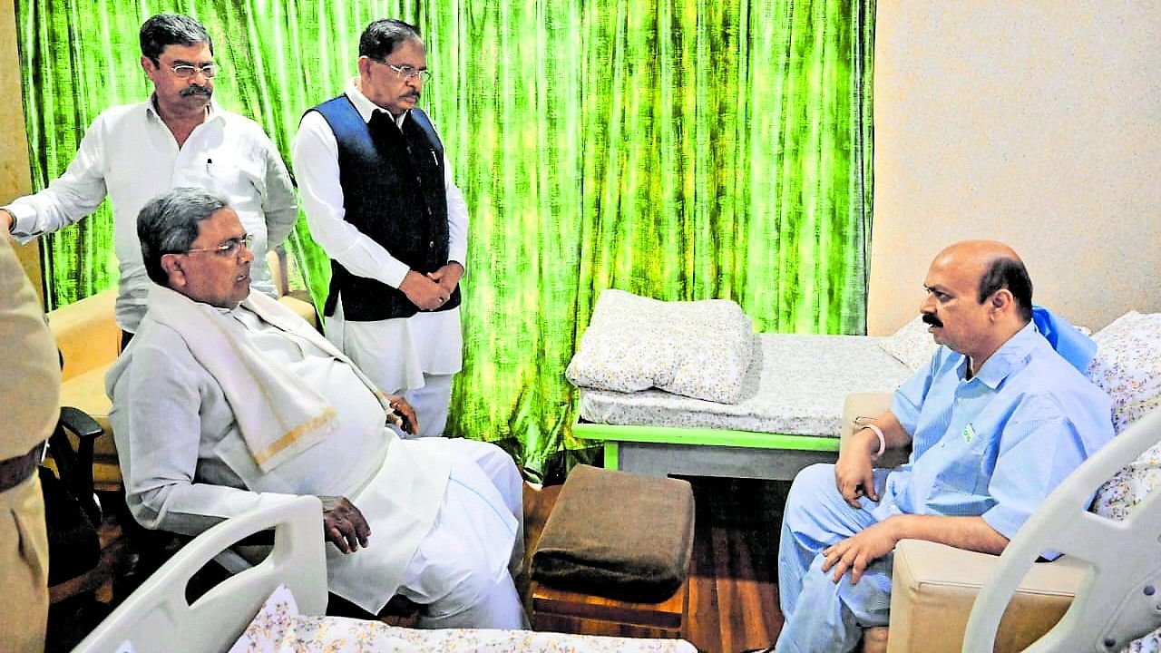 <div class="paragraphs"><p>Chief Minister Siddaramaiah calls on his predecessor Basavaraj Bommai, who recently underwent a heart surgery, at Fortis Hospital in Bengaluru on Saturday. He is accompanied by Home Minister G Parameshwara and political secretary&nbsp;Naseer Ahmed.&nbsp; &nbsp; &nbsp;</p></div>