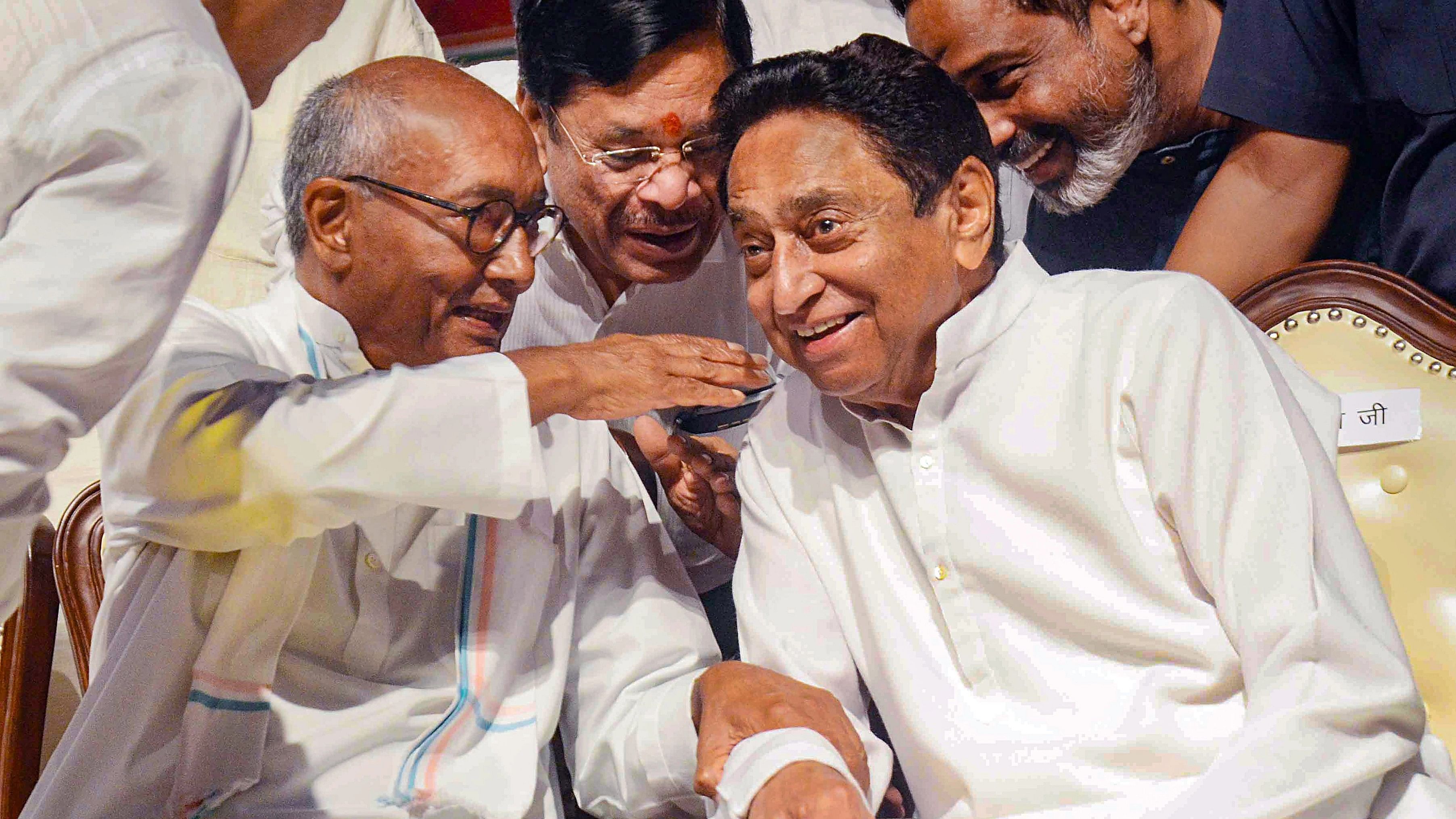 <div class="paragraphs"><p>Madhya Pradesh Congress President Kamal Nath with party leader Digvijaya Singh during the release of the party's 'Vachan Patra' (manifesto) for the upcoming State Assembly elections, in Bhopal.&nbsp;</p></div>