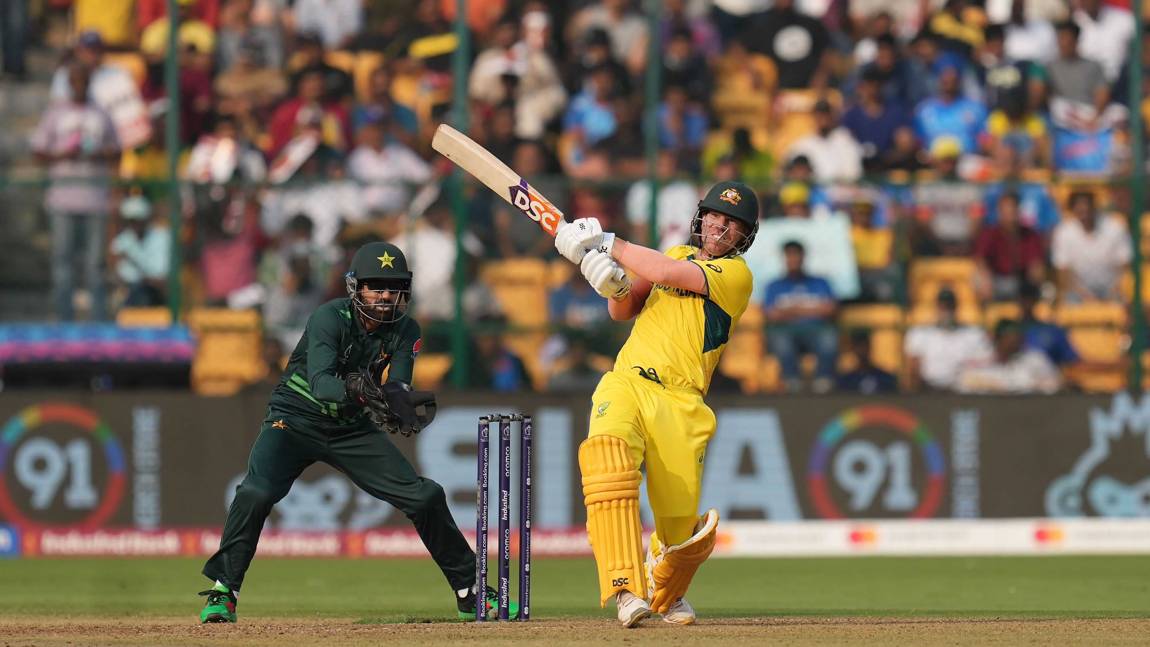 <div class="paragraphs"><p>Australia’s David Warner plays a shot during the ICC Men's Cricket World Cup 2023 match between Pakistan and Australia at M. Chinnaswamy Stadium, in Bengaluru, Friday, Oct. 20, 2023.</p></div>