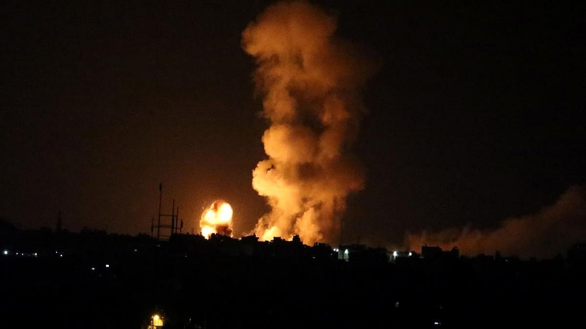 <div class="paragraphs"><p>An explosion is seen following an Israeli air strike in the southern Gaza Strip.</p></div>