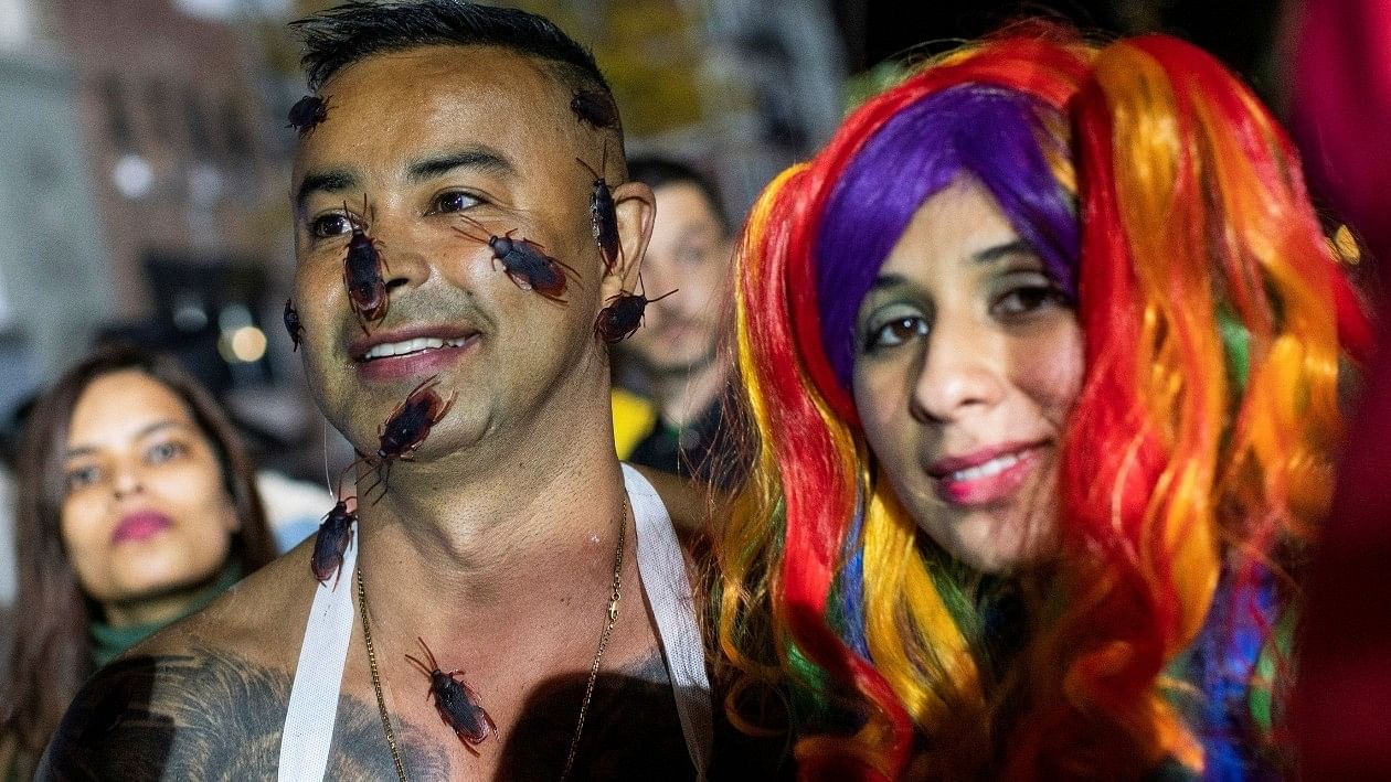 <div class="paragraphs"><p>Revellers dressed in colourful attires during the NYC Halloween Parade in New York. </p></div>
