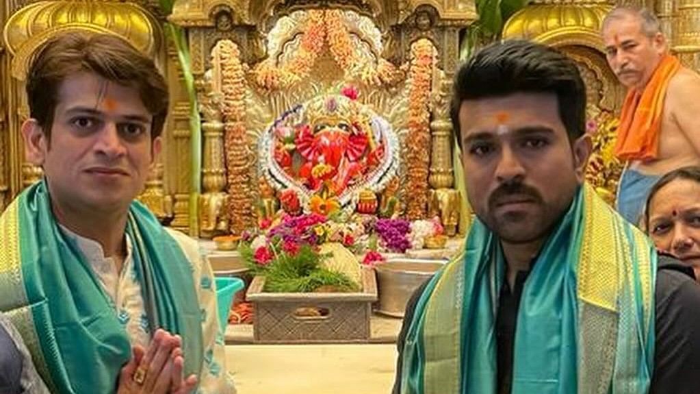 <div class="paragraphs"><p>Ram Charan with politician Rahul Kanal at&nbsp;Siddhivinayak Temple.</p></div>