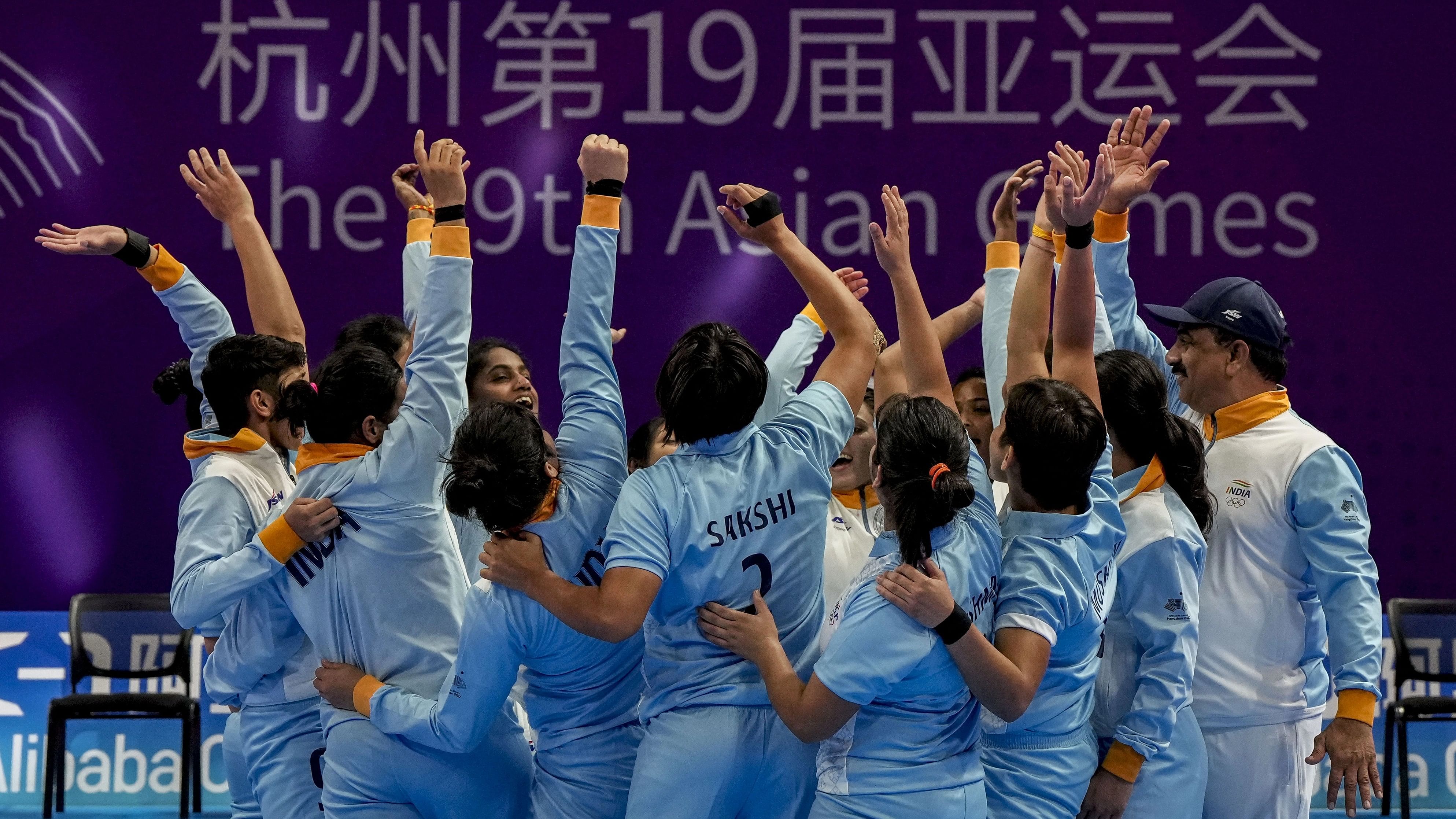 <div class="paragraphs"><p> Indian players celebrate winning the women's kabaddi semifinal match against Nepal at the 19th Asian Games.</p></div>