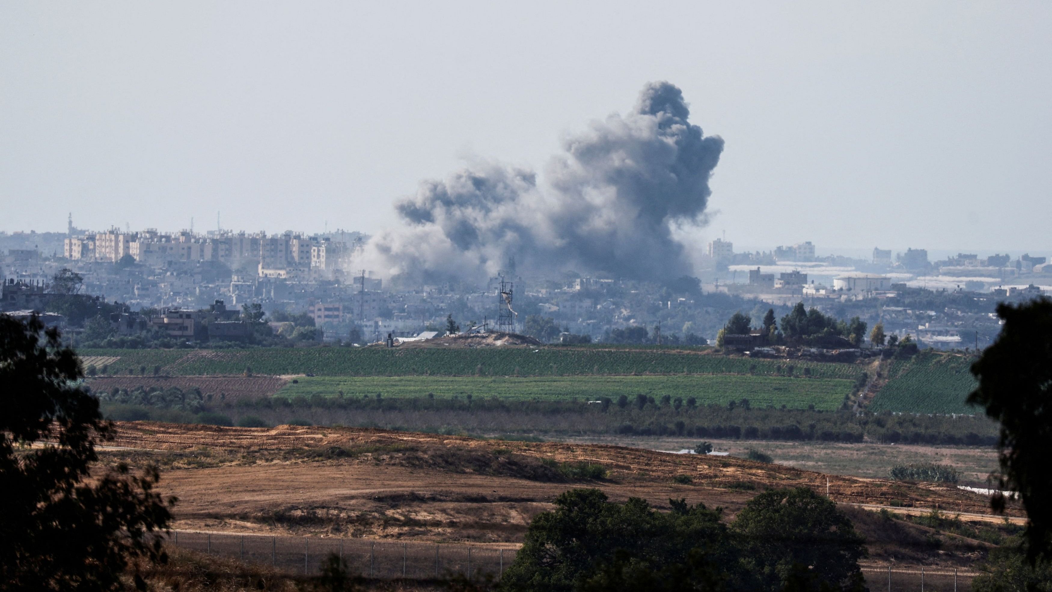 <div class="paragraphs"><p>Smoke rises in the air following Israeli bombings in Gaza, as seen from Israel's border with the Gaza Strip.</p></div>