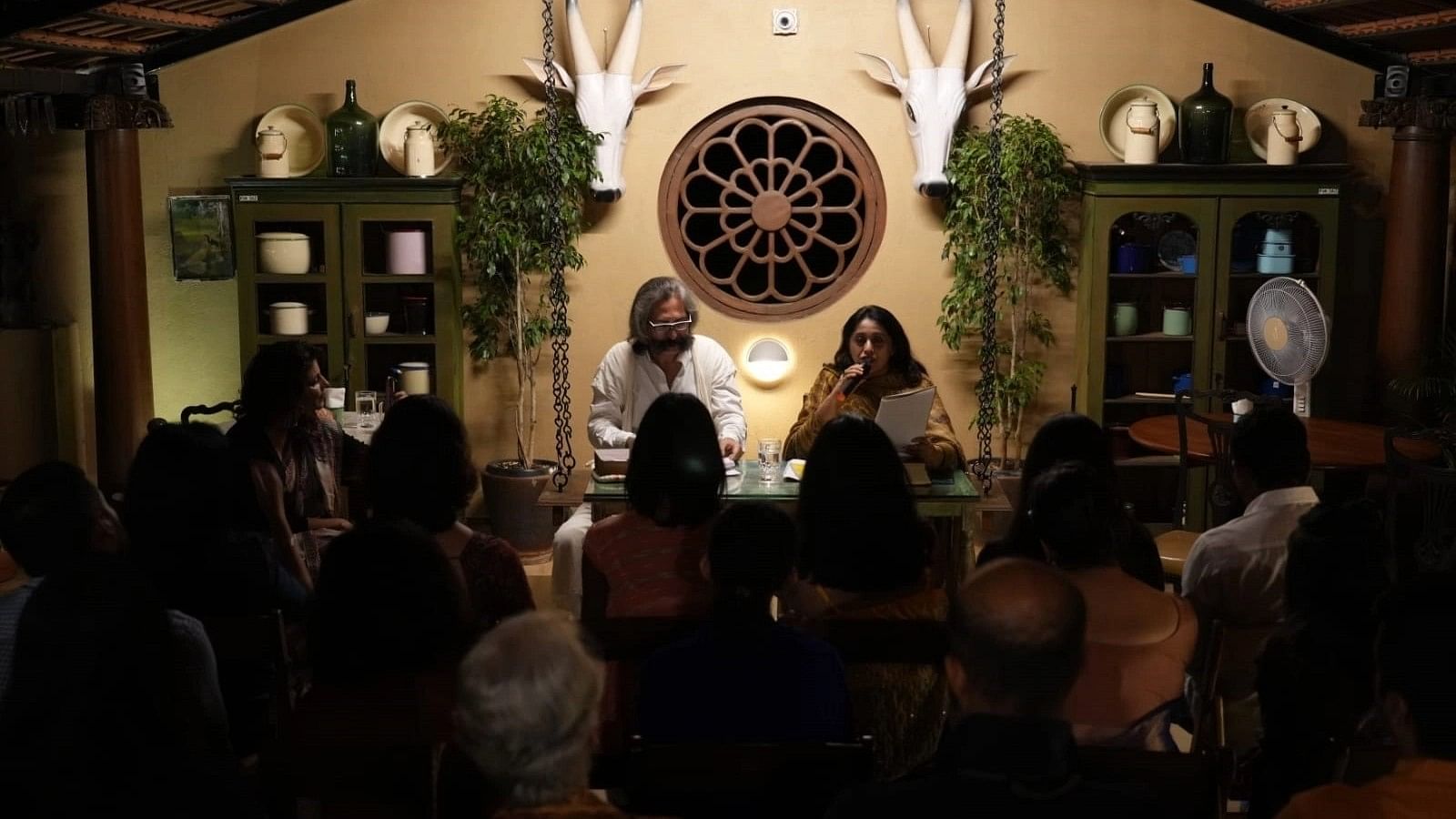 Kyoumars Freeman and Shaista Yacoob recite Rumi’s verses in Persian and English respectivley. The reading was held at a cafe in Langford Town recently.