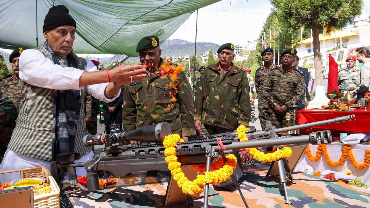 <div class="paragraphs"><p>Rajnath Singh performing shastra puja at Tawang in Arunachal Pradesh on Monday.</p></div>