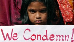 <div class="paragraphs"><p>A girl holds a placard in New Delhi protests against rape.&nbsp;</p></div>