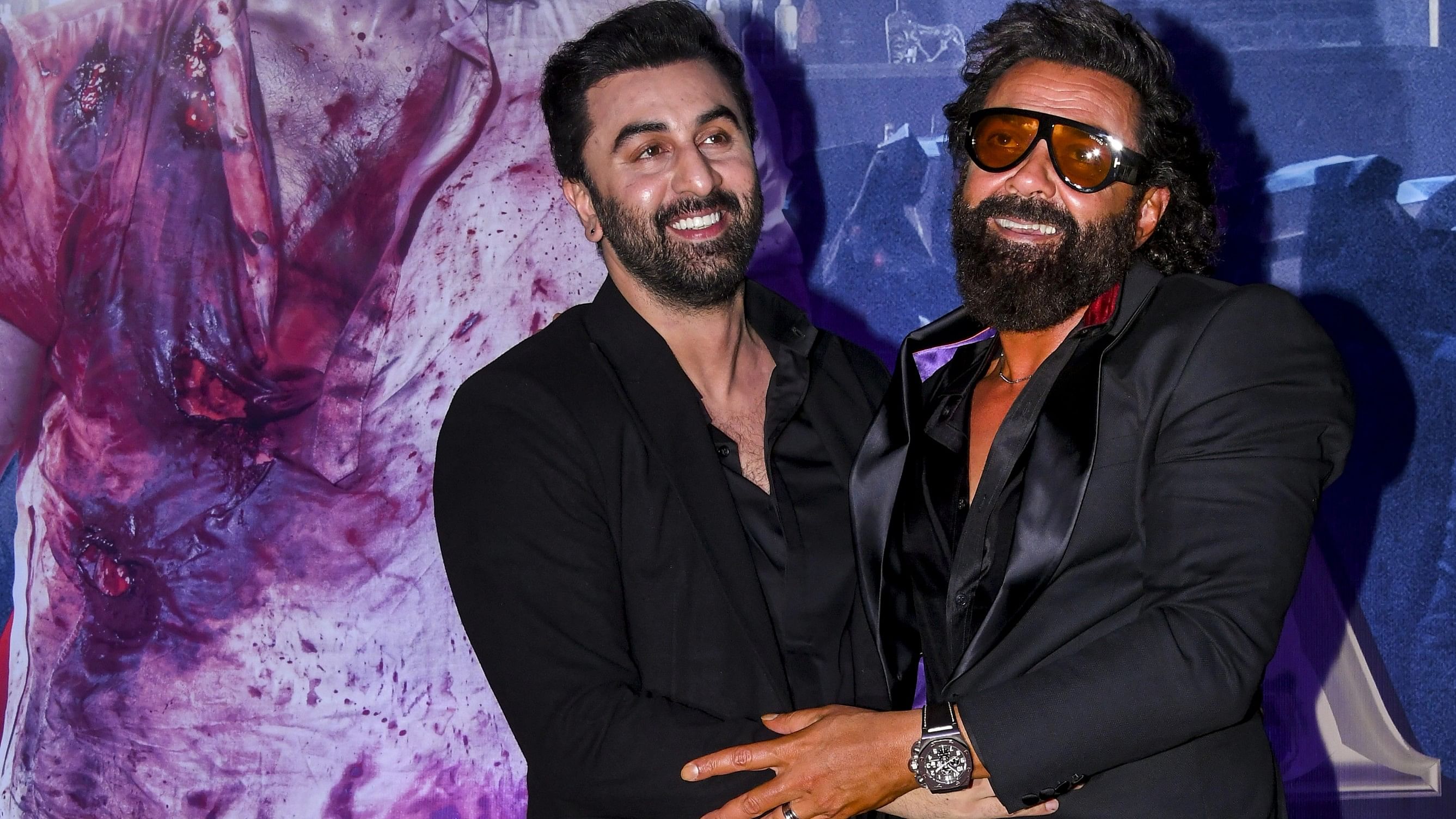 <div class="paragraphs"><p>Actors Ranbir Kapoor and Bobby Deol at the trailer launch of their upcoming film 'Animal', in New Delhi.&nbsp;</p></div>
