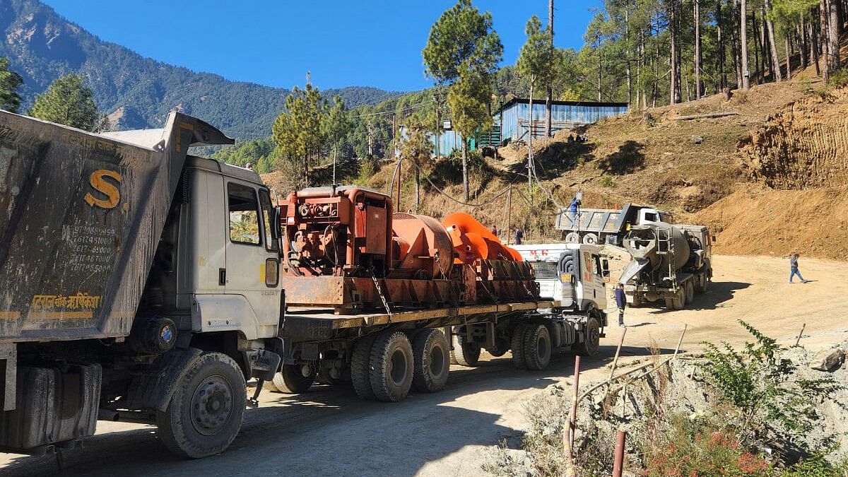 <div class="paragraphs"><p>A new auger machine arrives at the site where road workers are trapped in a tunnel after a portion of it collapsed, in Uttarkashi.</p></div>