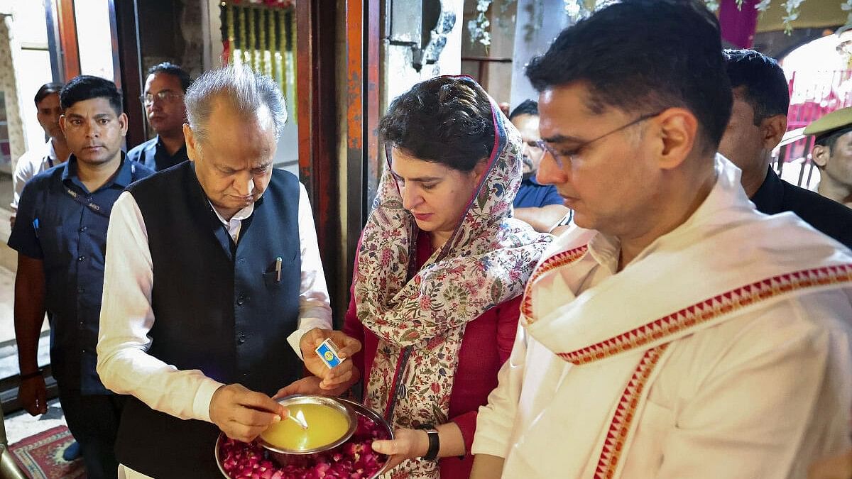 <div class="paragraphs"><p>Rajasthan Chief Minister Ashok Gehlot with Congress leaders Priyanka Gandhi Vadra and Sachin Pilot offers prayers at Mehandipur Balaji Temple, in Dausa district.&nbsp;</p></div>