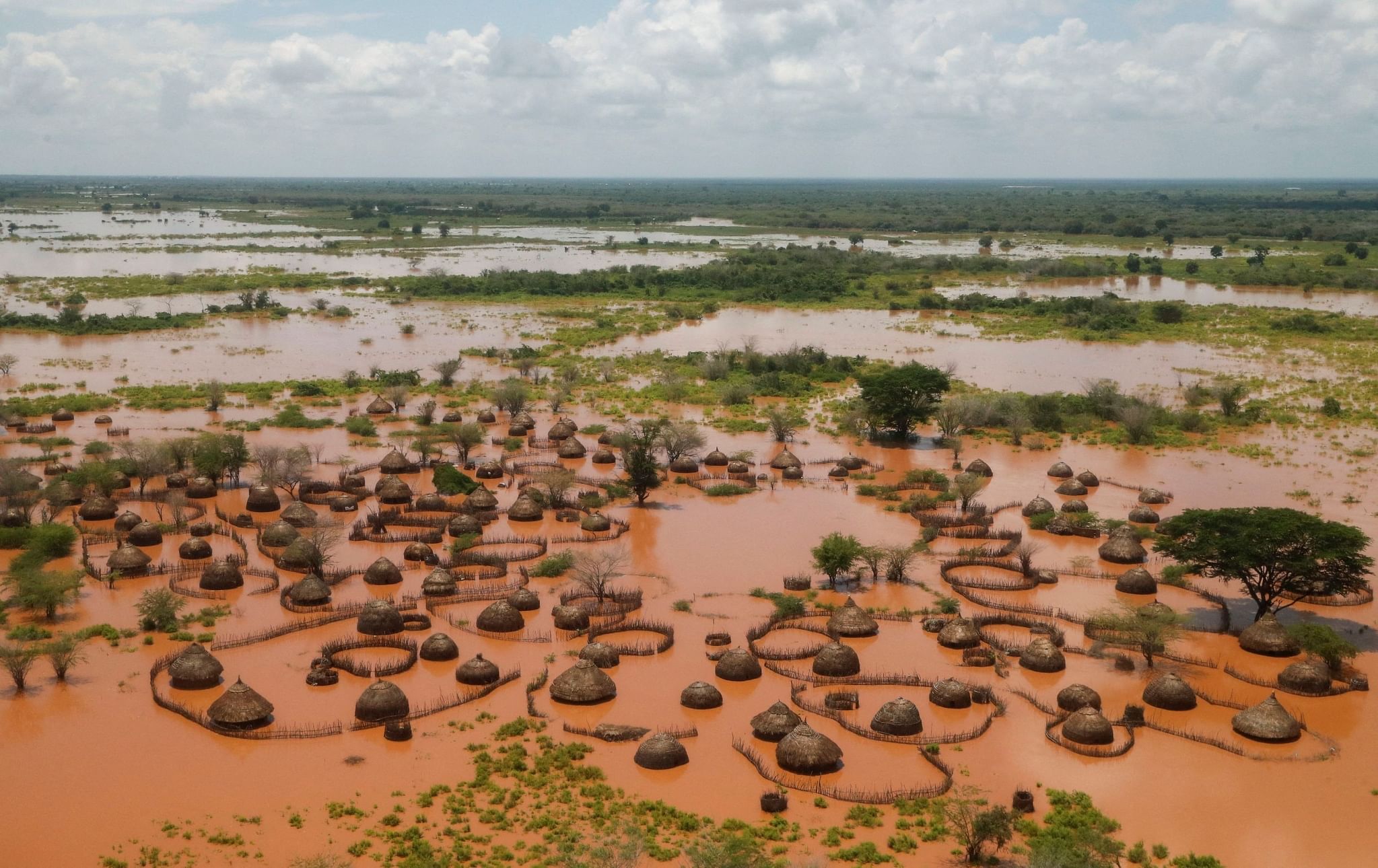 <div class="paragraphs"><p>An aerial view shows a deserted and flooded traditional homestead following heavy rains in Garsen, Tana Delta within Tana River county, Kenya November 23, 2023. </p></div>