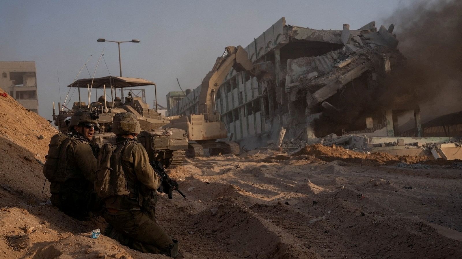 <div class="paragraphs"><p>Israeli soldiers hold a position amid the ongoing ground operation of the Israeli army against the Palestinian Islamist group Hamas, in the Gaza Strip, in this handout image released by the Israel Defense Forces on November 8, 2023.</p></div>