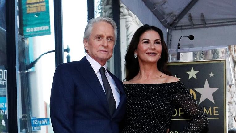 <div class="paragraphs"><p>Catherine Zeta-Jones with husband Michael Douglas.</p></div>