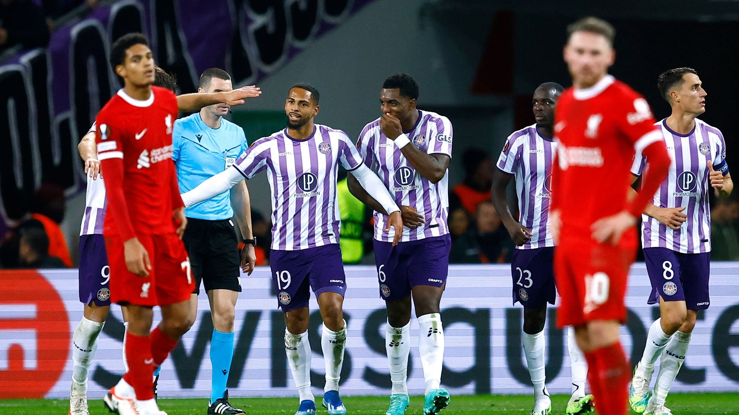 <div class="paragraphs"><p>Toulouse's Frank Magri celebrates scoring their third goal with Logan Costa and teammates.</p></div>