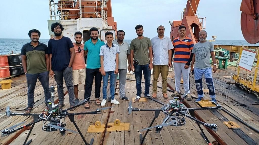 <div class="paragraphs"><p>Researchers and professors from IIT-M with the unmanned aerial vehicles.</p></div>