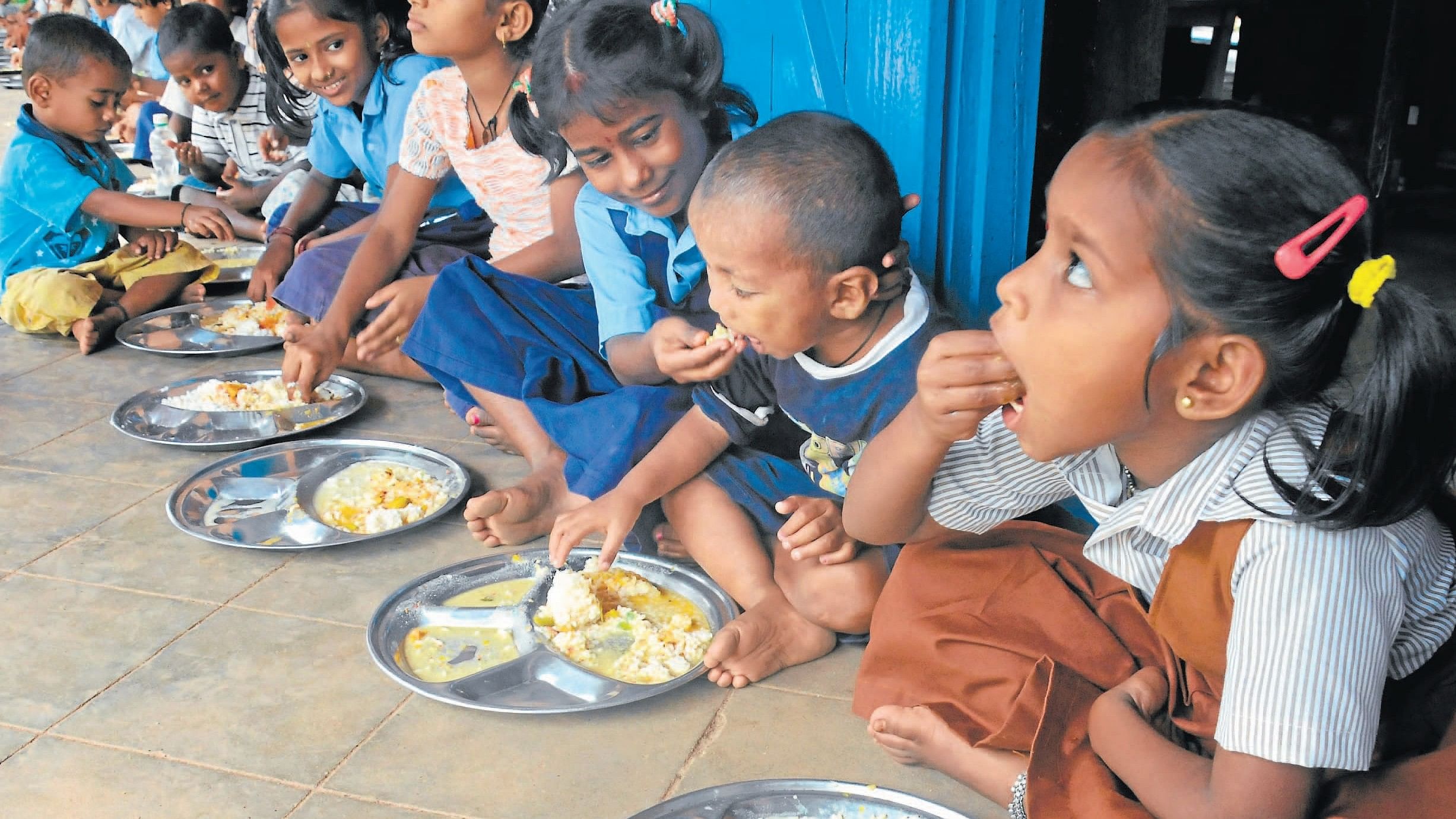 <div class="paragraphs"><p>Representative image of children having their midday meals. </p></div>