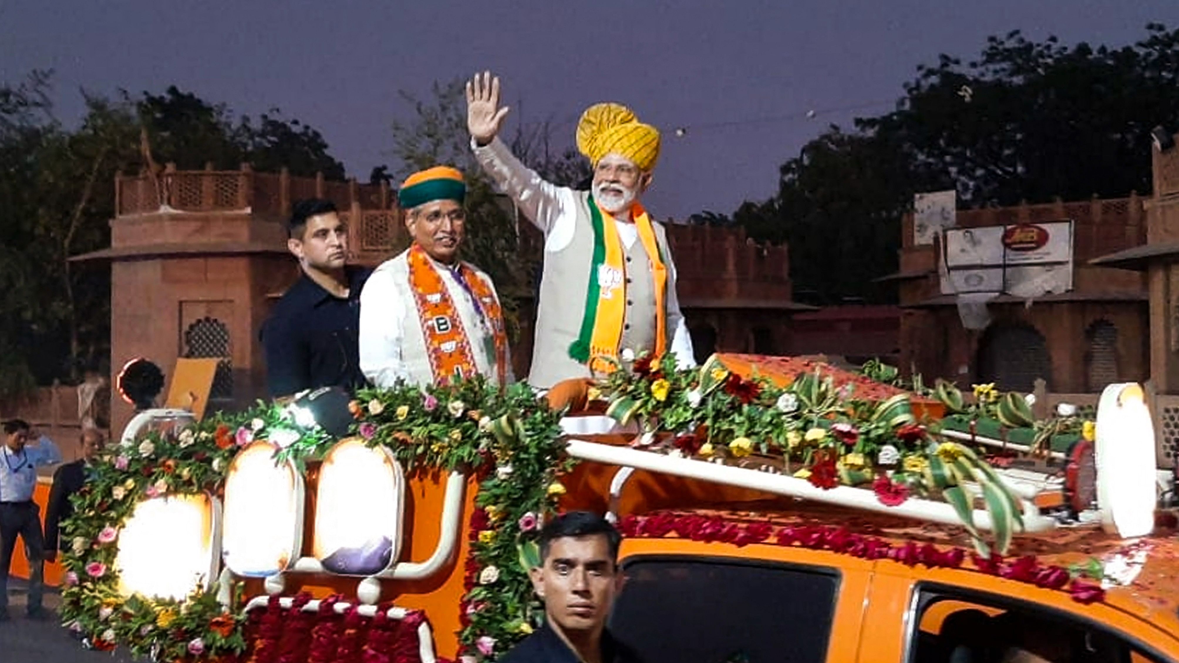 <div class="paragraphs"><p>Prime Minister Narendra Modi during a road show ahead of Rajasthan Assembly elections 2023, in Bikaner, Monday, Nov. 20, 2023.</p></div>