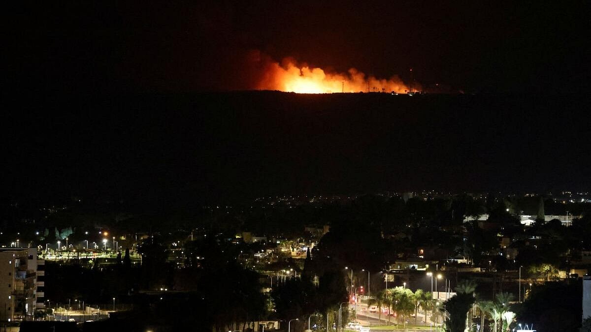 <div class="paragraphs"><p>A view shows smoke and fire in Lebanon, near the border with Israel, as seen from Nahariya in northern Israel.</p></div>